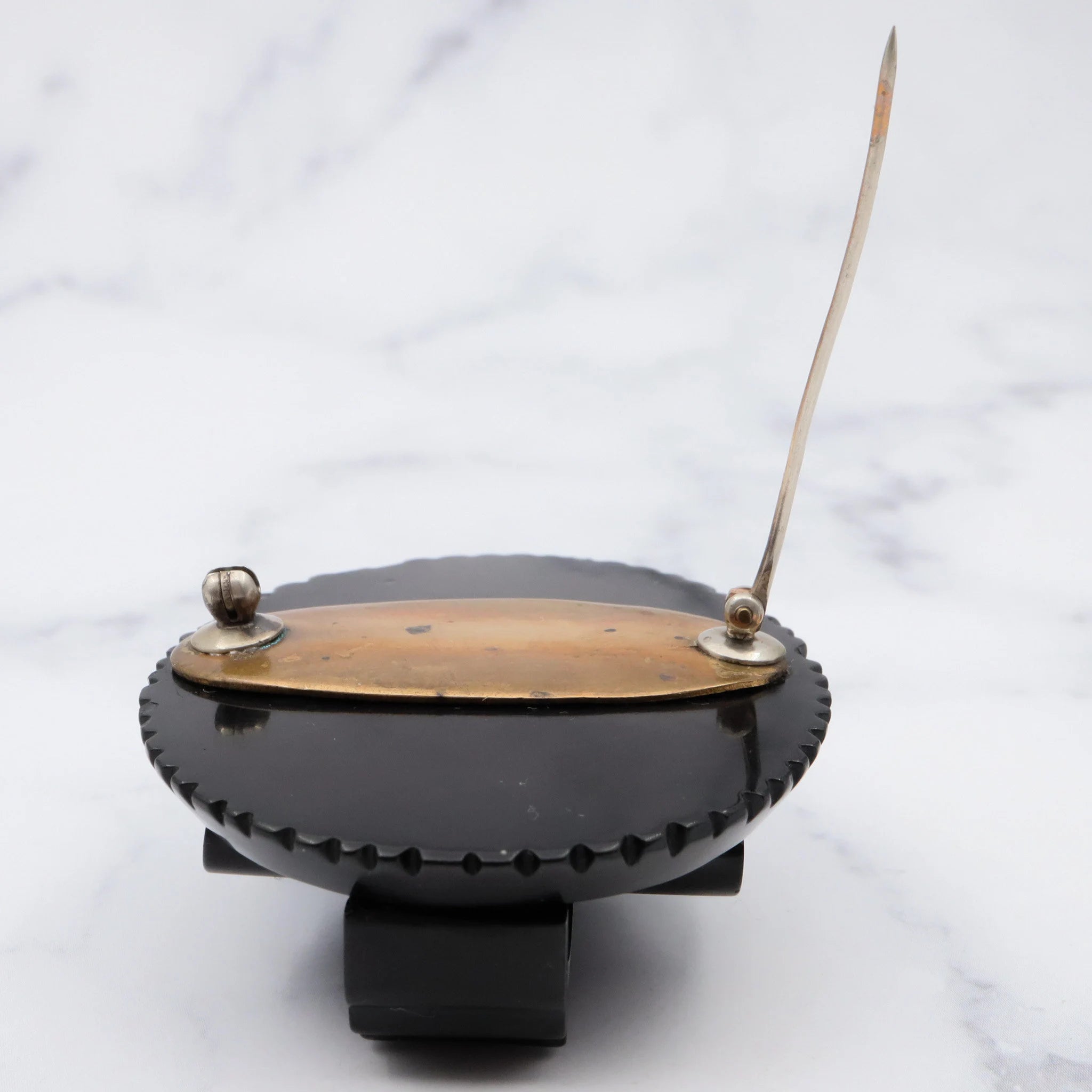 Antique Victorian caved bakelite mourning brooch