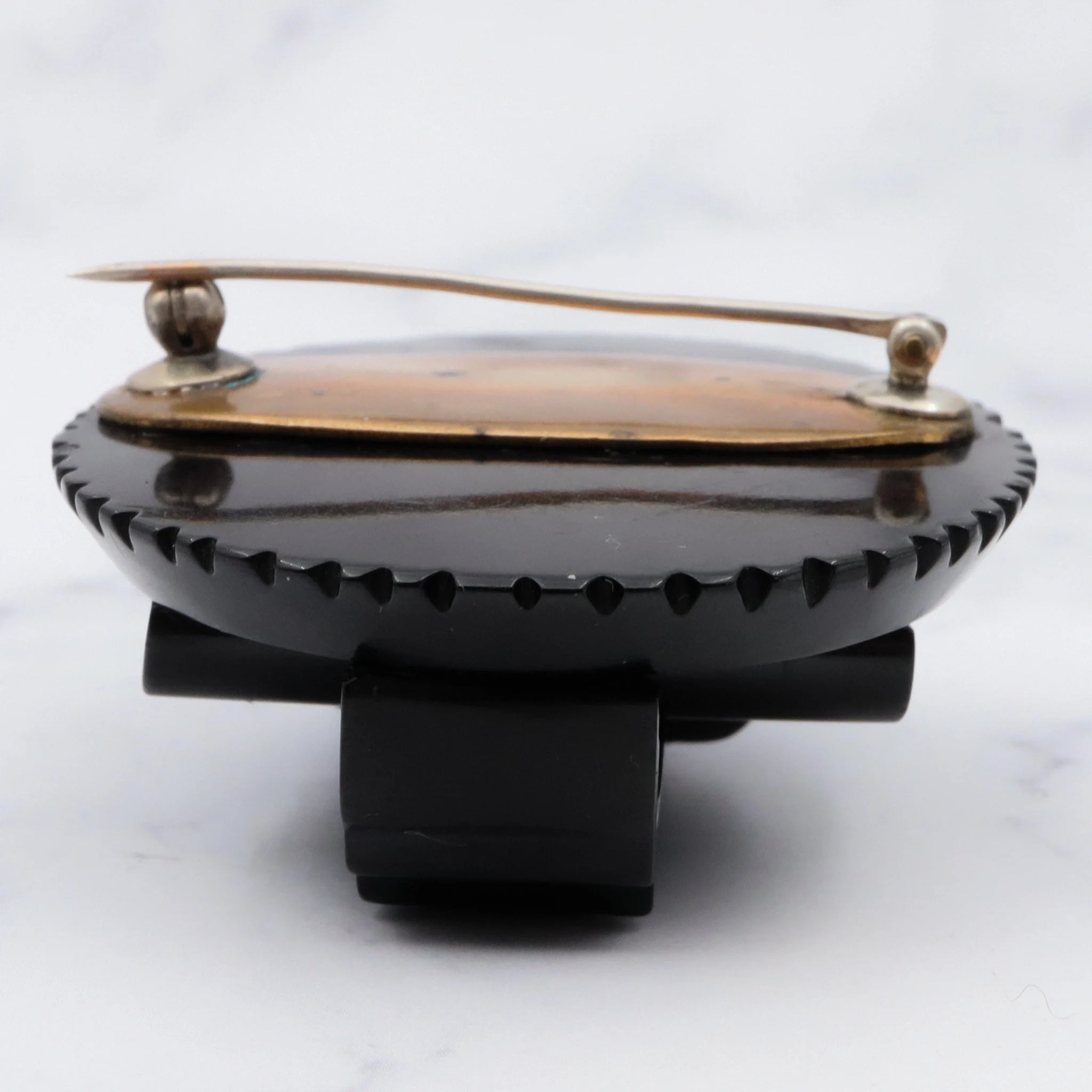 Antique Victorian caved bakelite mourning brooch