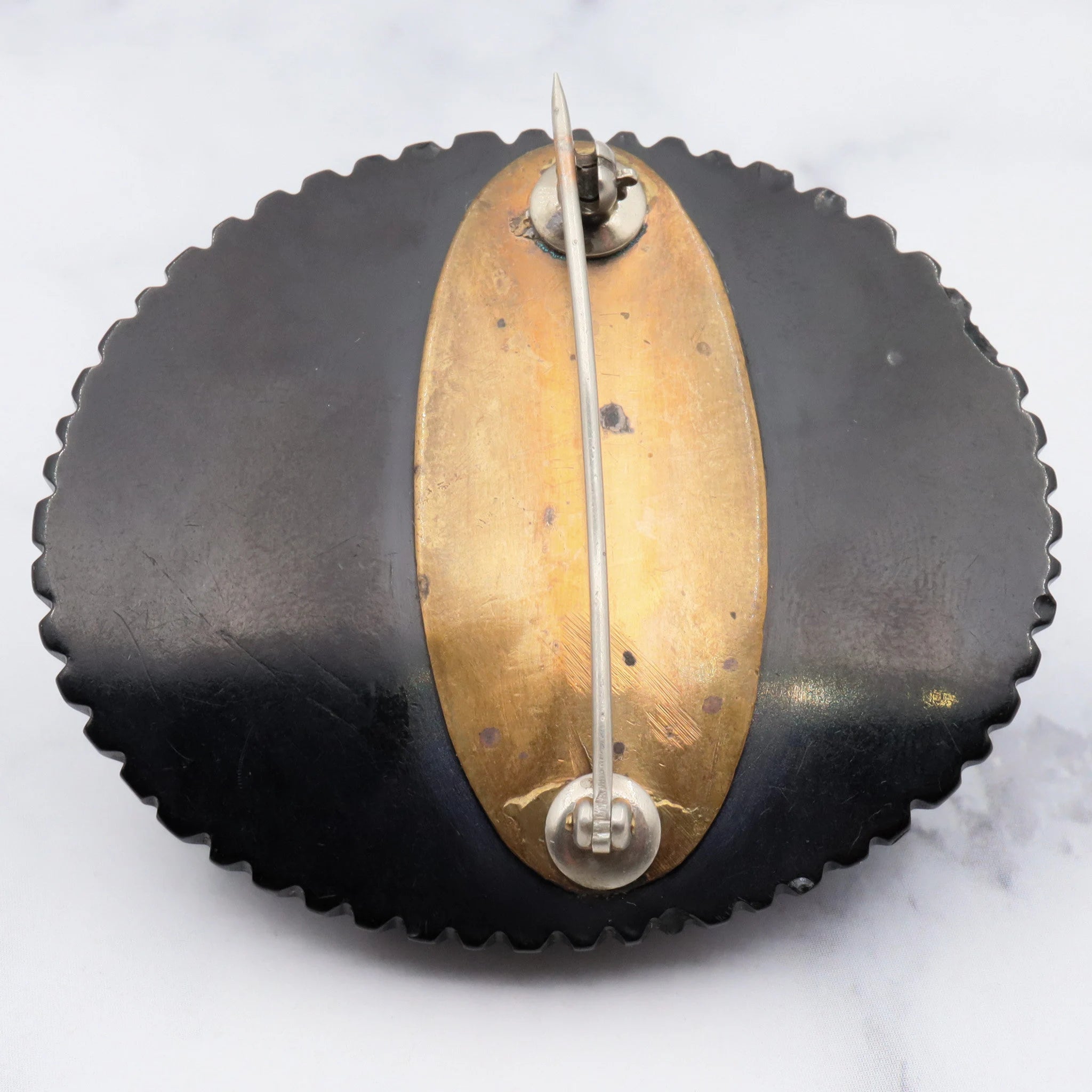 Antique Victorian caved bakelite mourning brooch