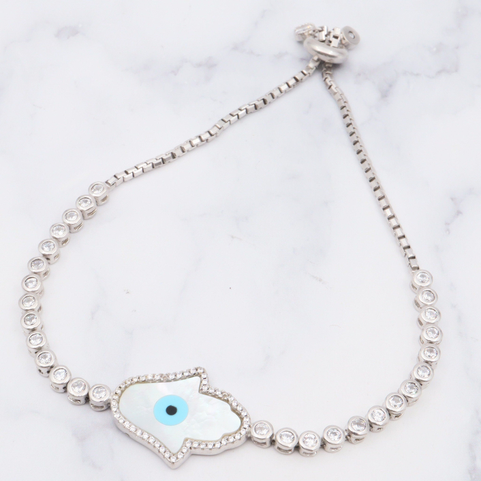 Vintage sterling, mother of pearl, hand of fatima and evil eye bracelet with cubic zirconia links