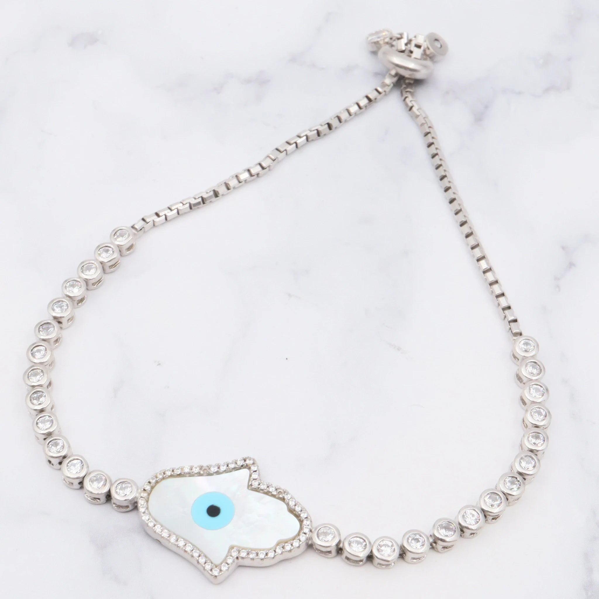 Vintage sterling, mother of pearl, hand of fatima and evil eye bracelet with cubic zirconia links