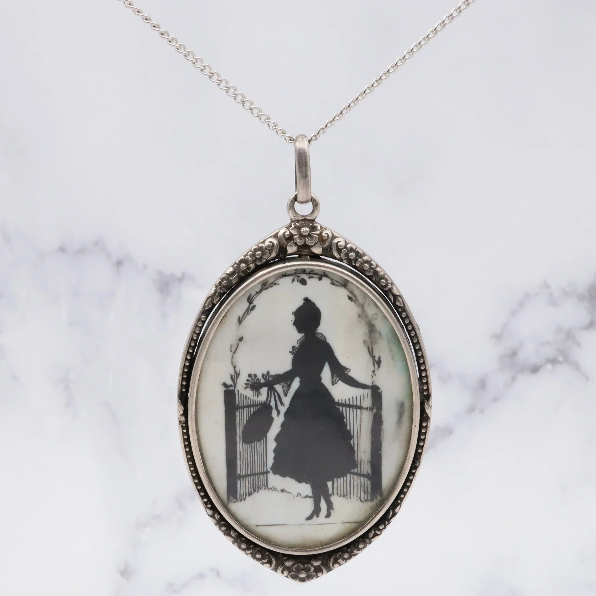 Antique Victorian sterling hand painted silhouette portrait pendant