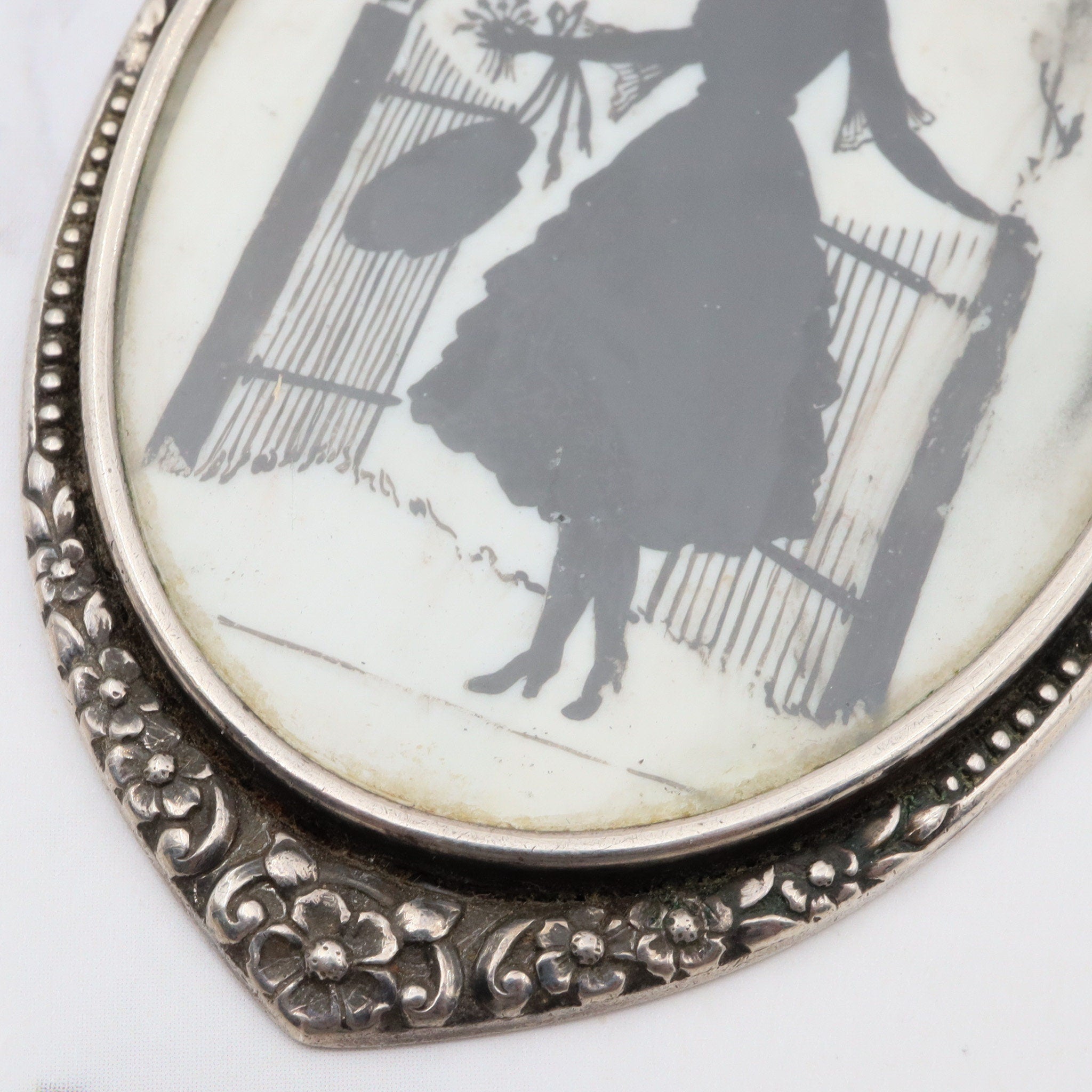 Antique sterling hand painted silhouette portrait pendant