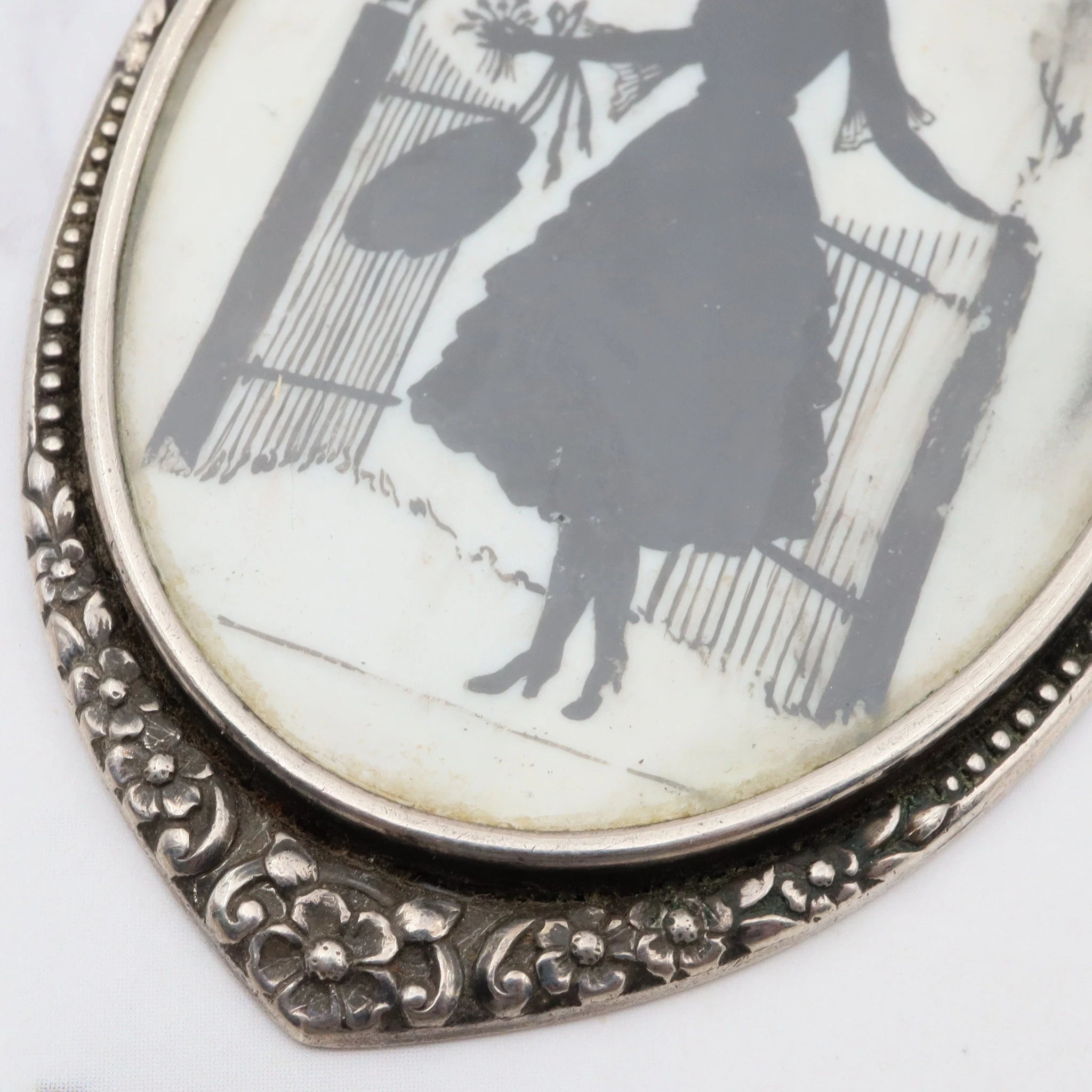 Antique Victorian sterling hand painted silhouette portrait pendant