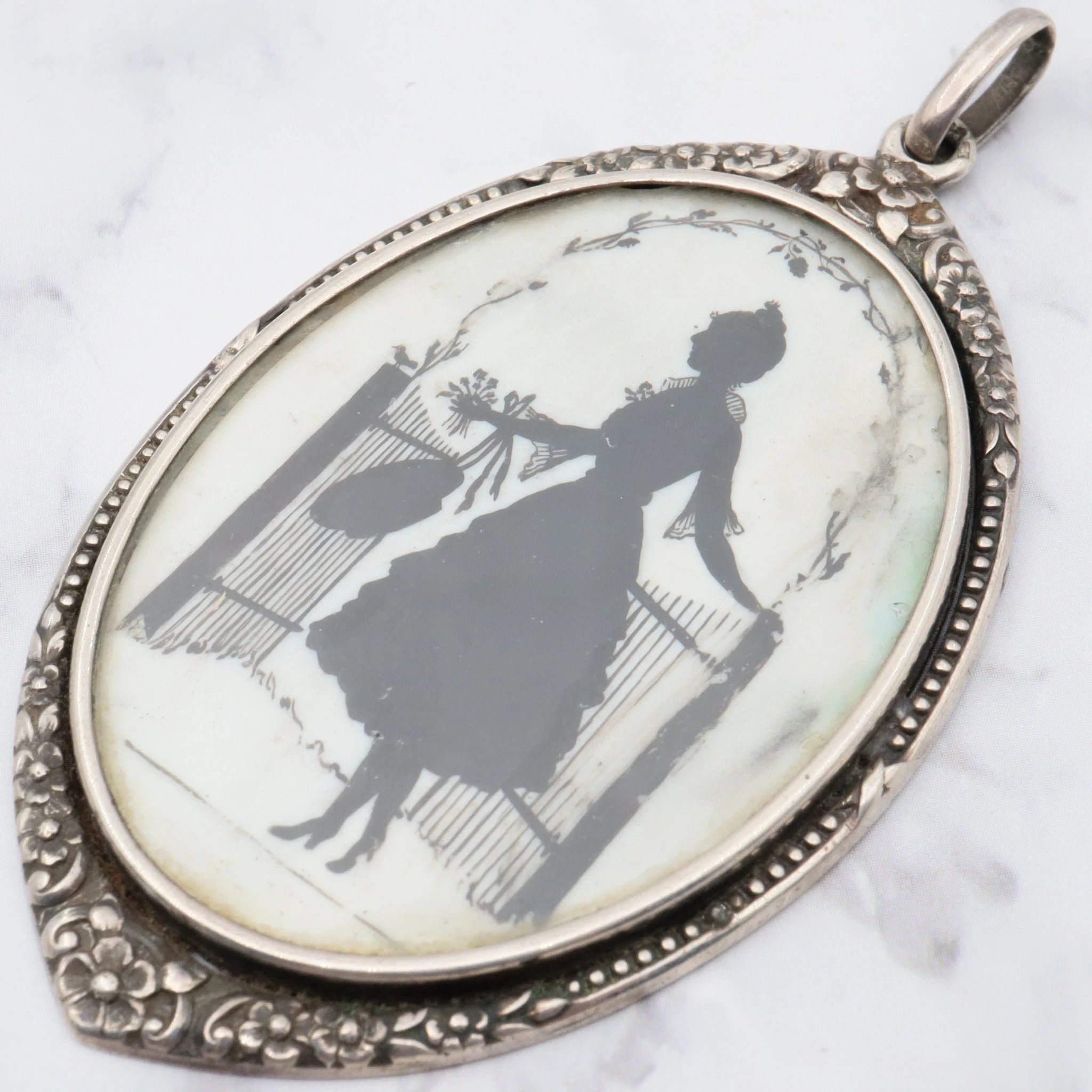 Antique Victorian sterling hand painted silhouette portrait pendant