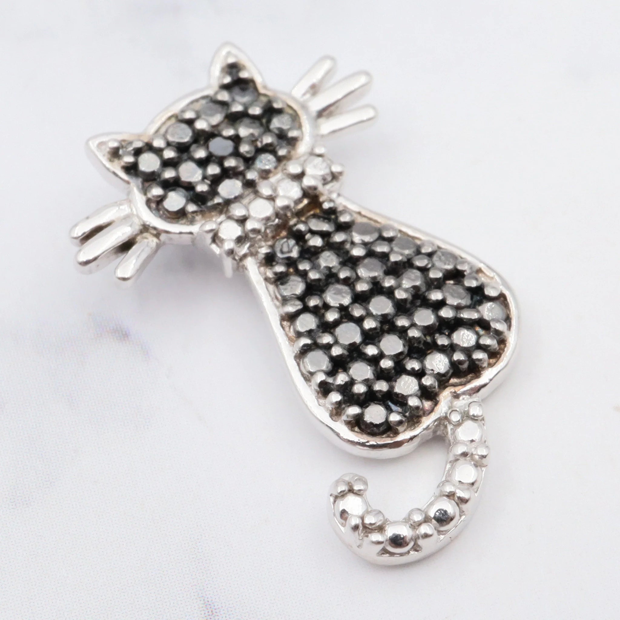 Vintage sterling cat pendant with hematite accents