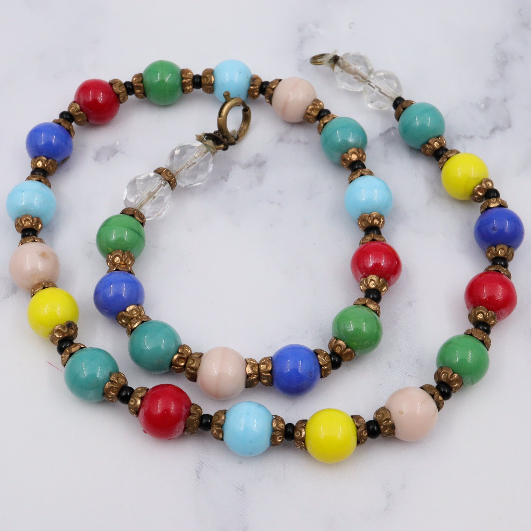 Antique rainbow glass beaded necklace with brass spacers, 16.5"