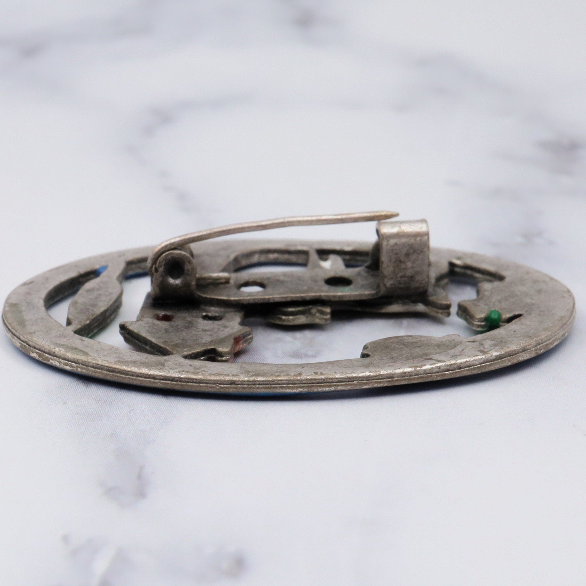 Antique silver tone enamel brooch