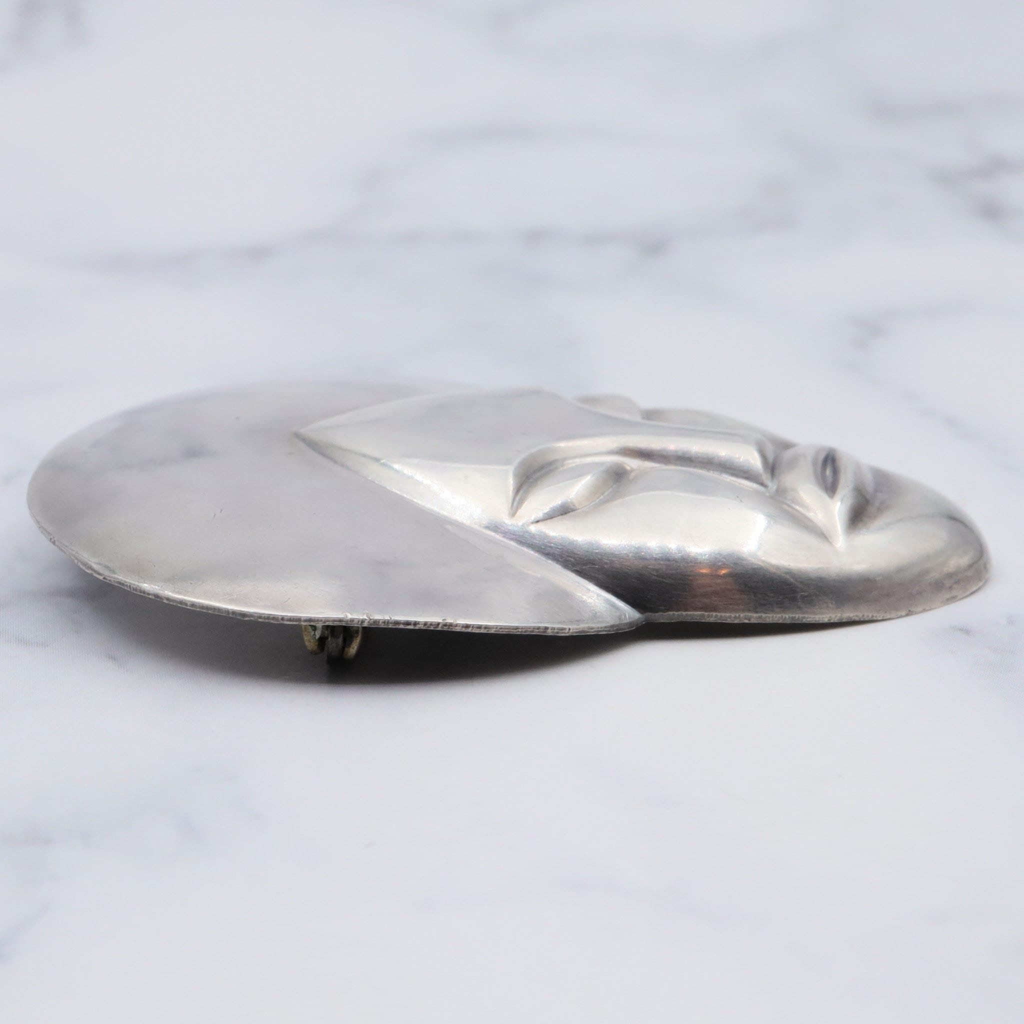 Vintage sterling face brooch