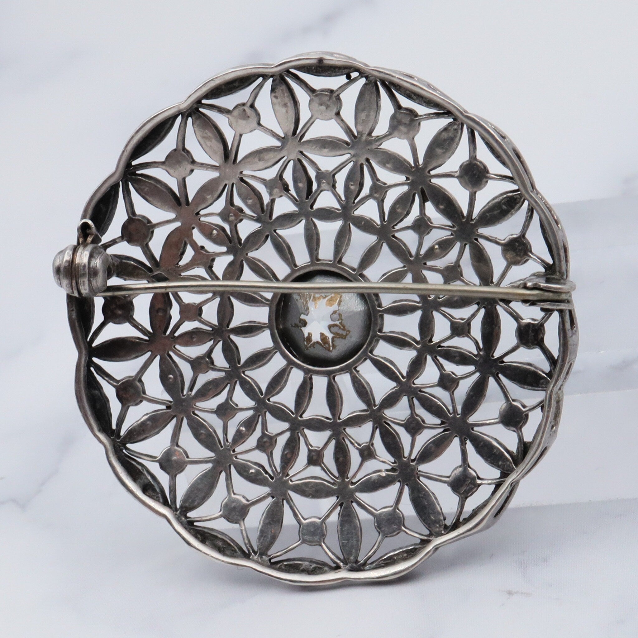 Antique French Art Deco .900 silver & paste filigree circle brooch by Andre Godefroy