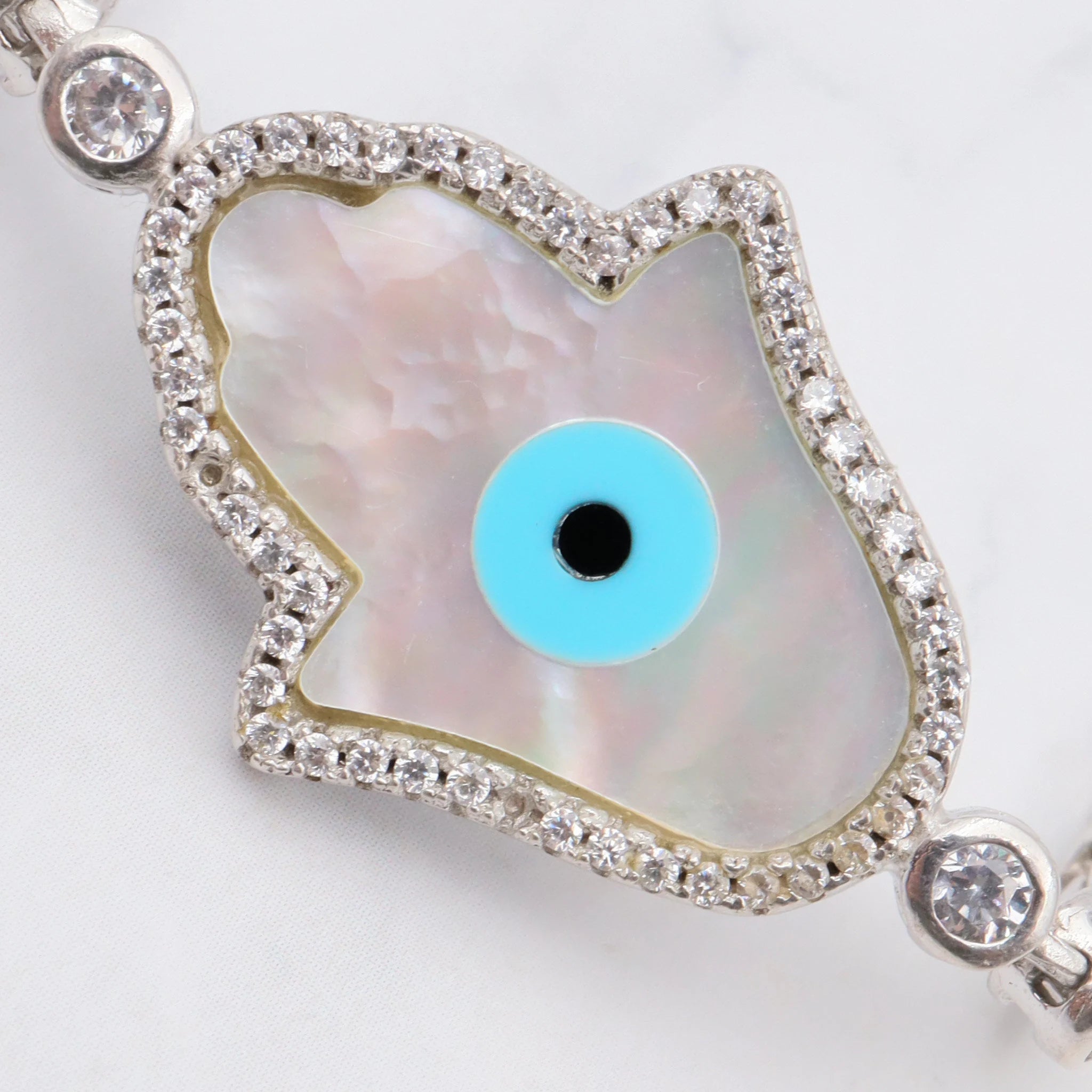 Vintage sterling, mother of pearl, hand of fatima and evil eye bracelet with cubic zirconia links