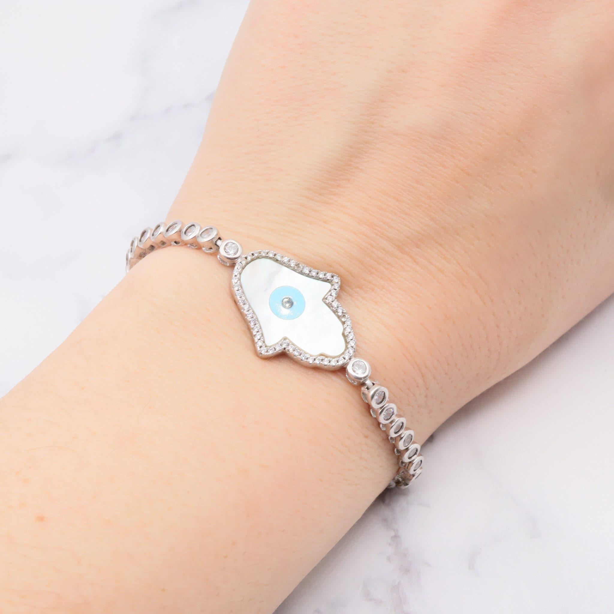 Vintage sterling, mother of pearl, hand of fatima and evil eye bracelet with cubic zirconia links