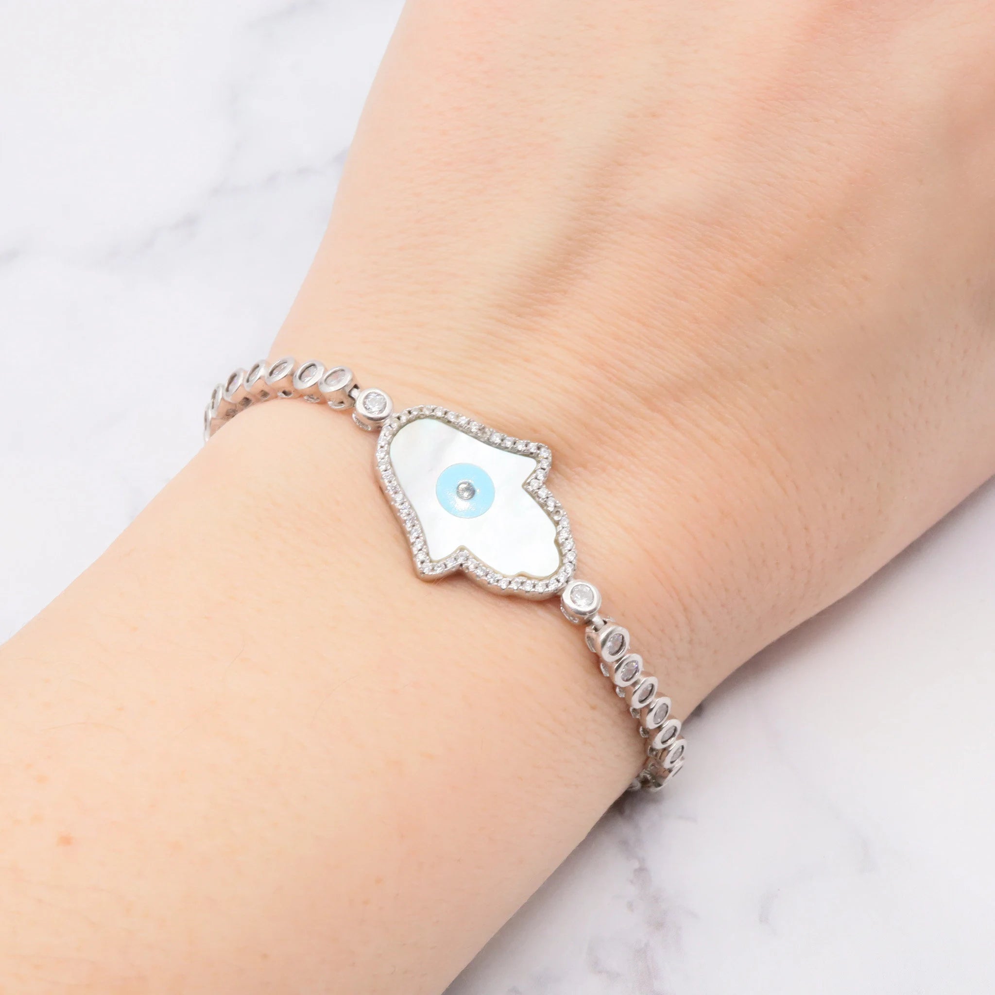 Vintage sterling, mother of pearl, hand of fatima and evil eye bracelet with cubic zirconia links