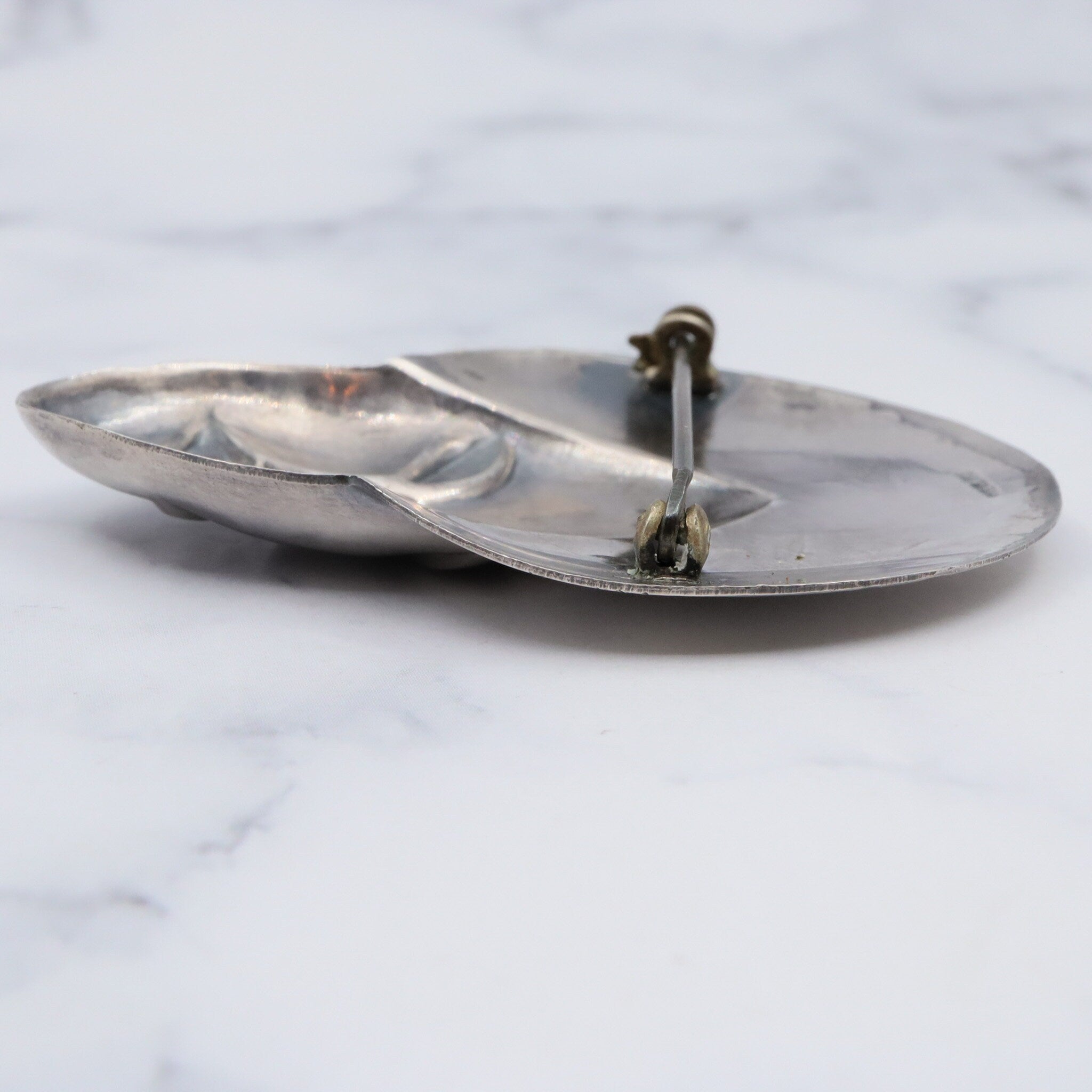 Vintage sterling face brooch