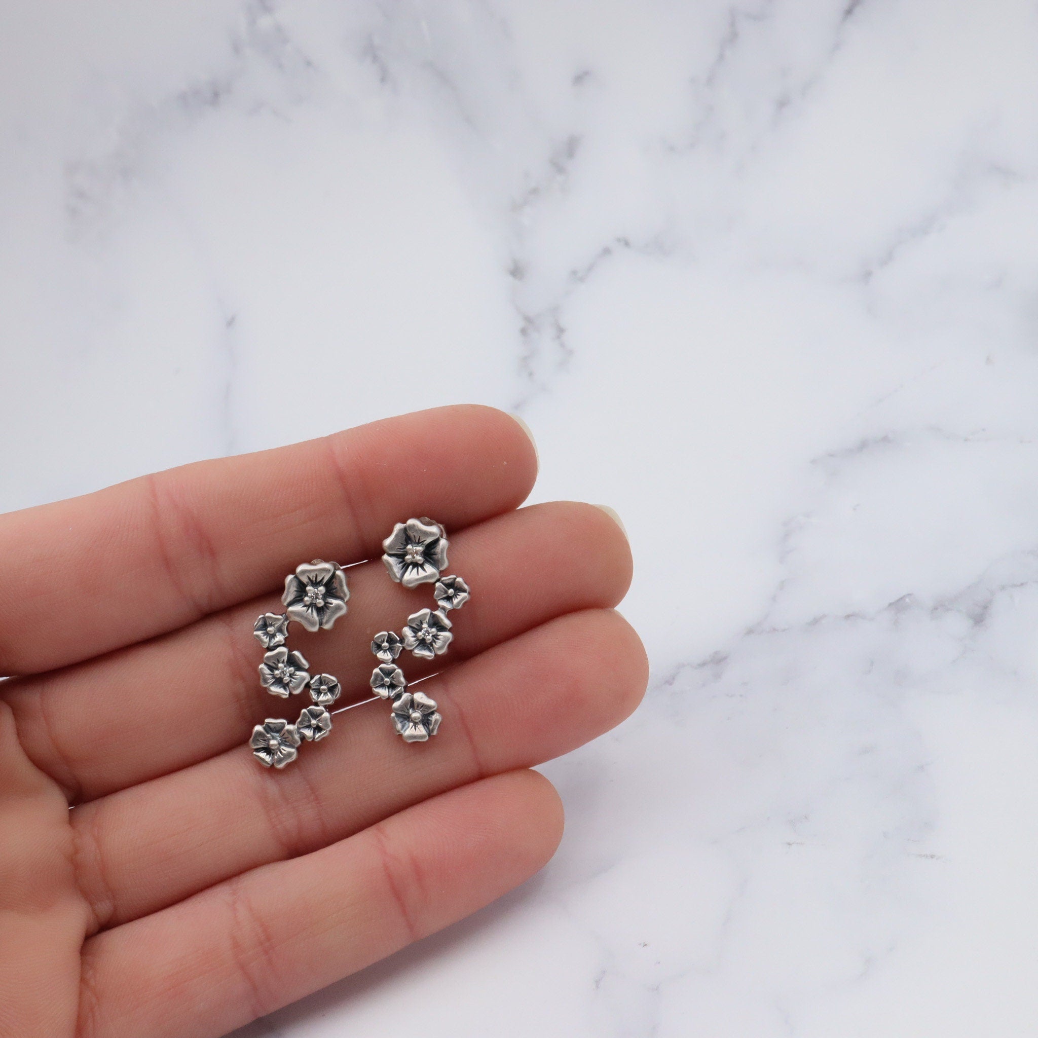 Vintage sterling & diamond flower earrings by “Lyric”