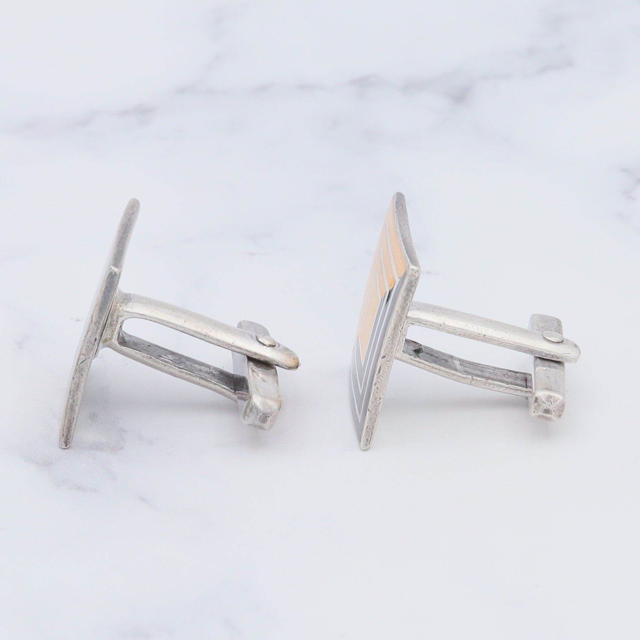 Antique Deco Margot de Taxco sterling cufflinks with black and gold enamel