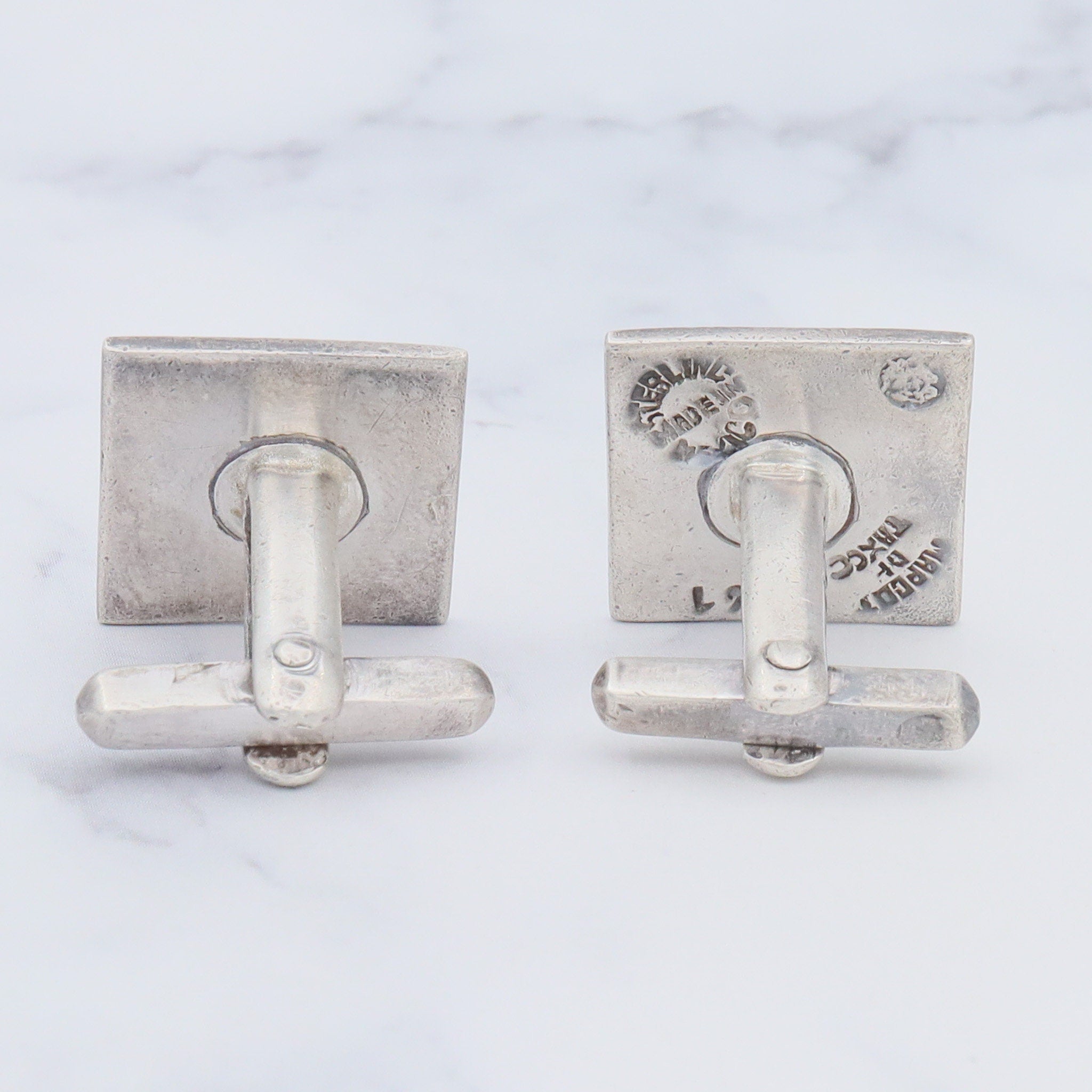 Antique Deco Margot de Taxco sterling cufflinks with black and gold enamel