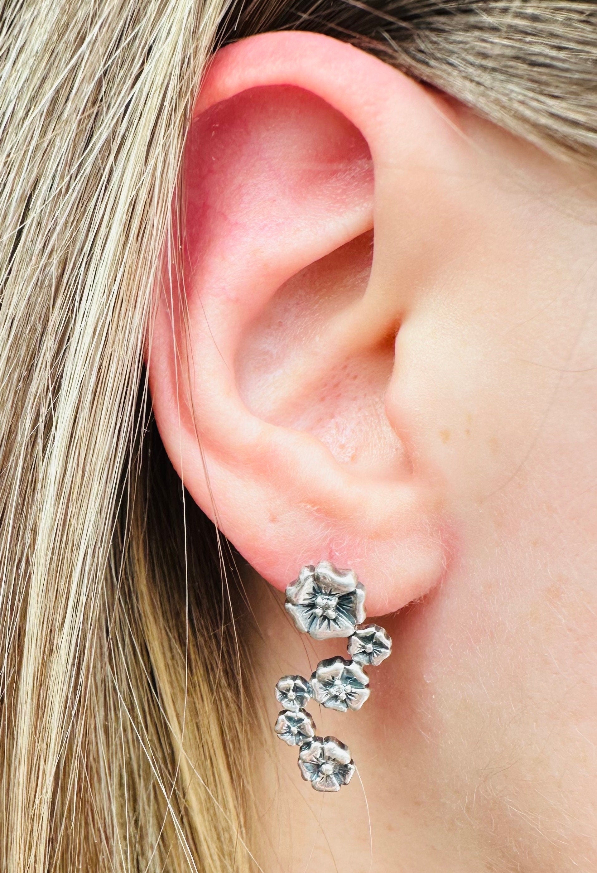 Vintage sterling & diamond flower earrings by “Lyric”