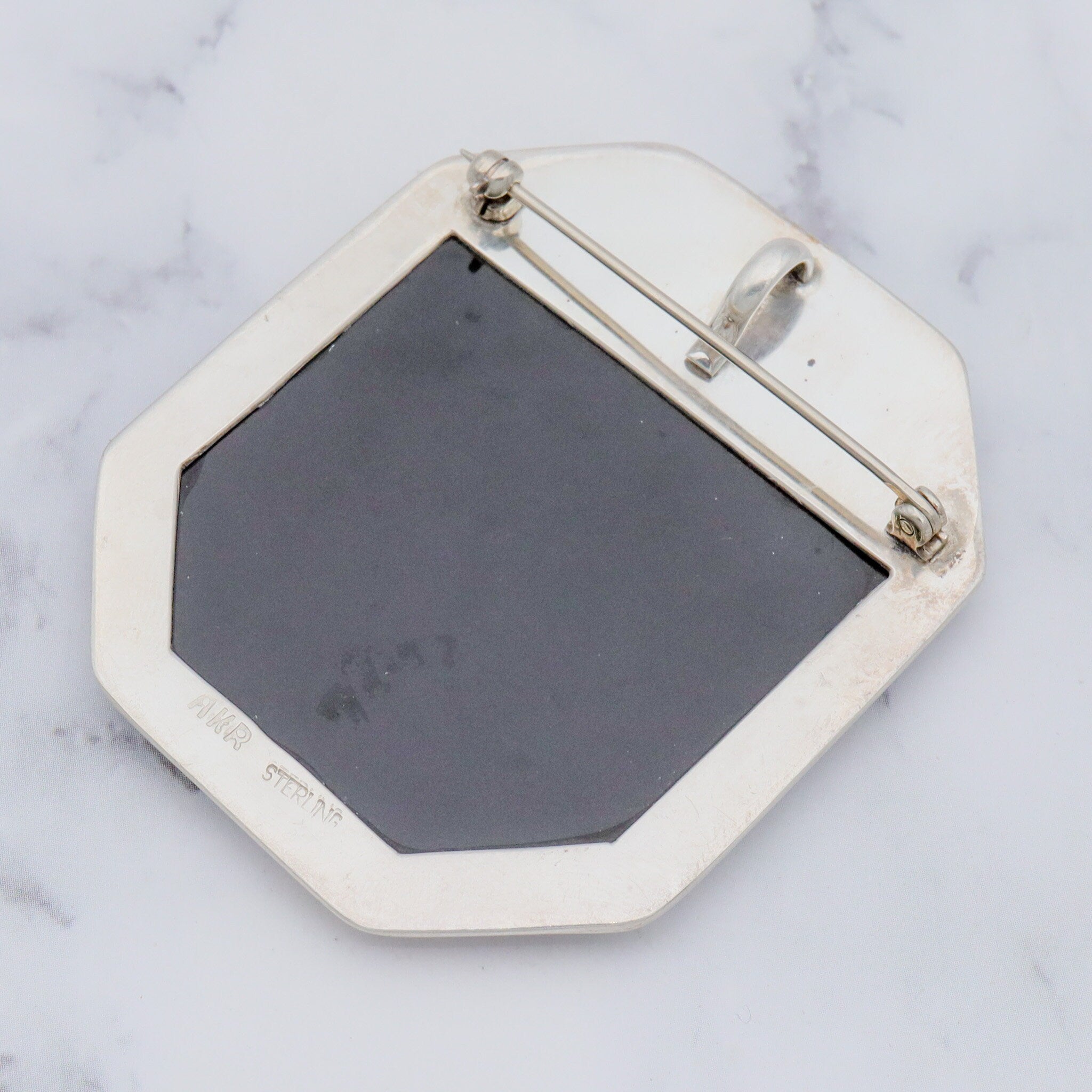 Vintage Amy Kahn Russel sterling, onyx framed dendritic calcite intarsia pendant/brooch