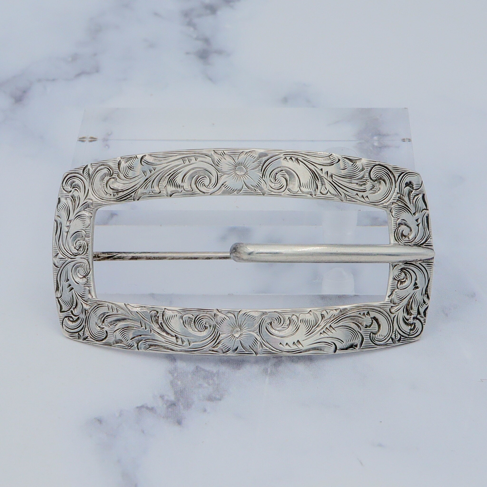Pair of Antique bright cut engraved sterling Unger Brothers buckle brooches