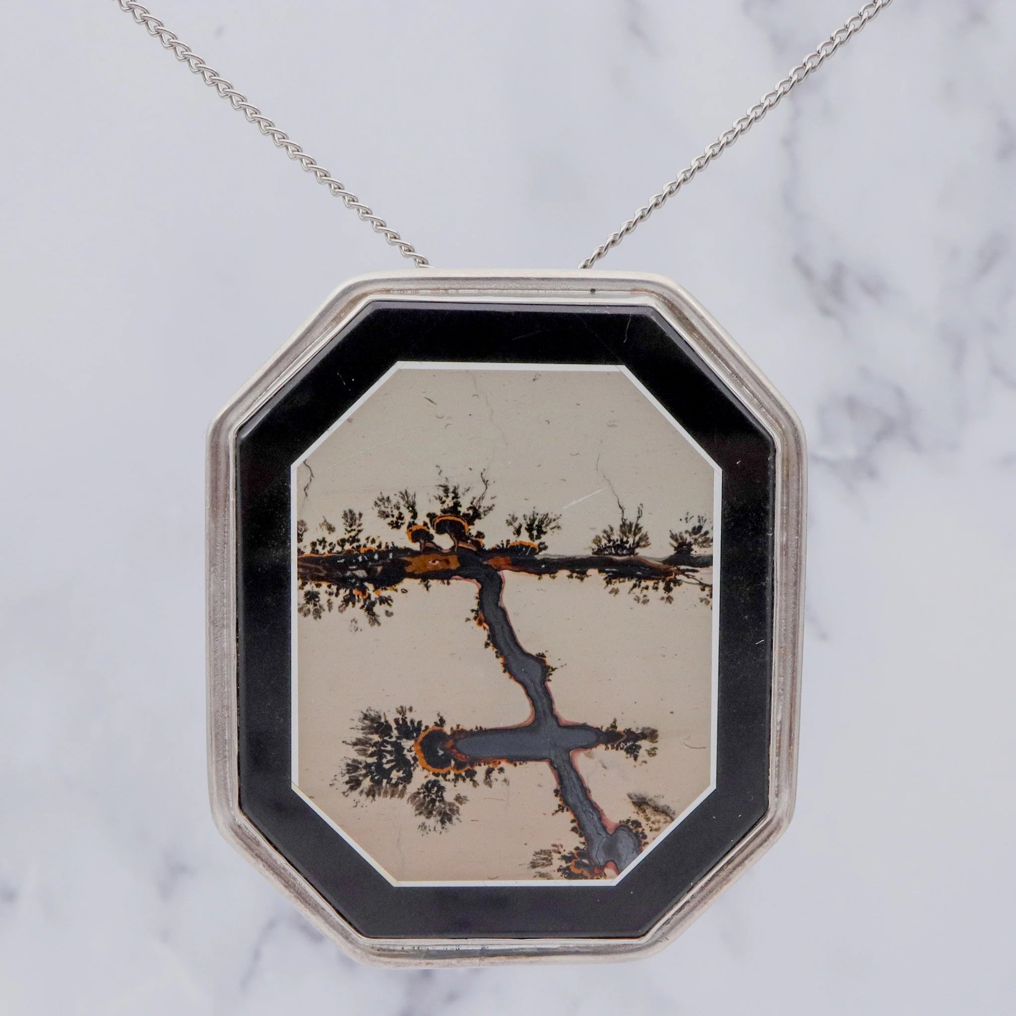 Vintage Amy Kahn Russel sterling, onyx framed dendritic calcite intarsia pendant/brooch
