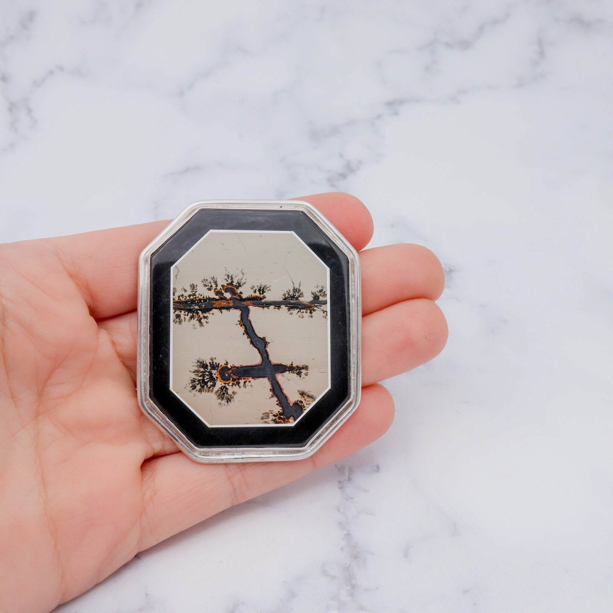 Vintage Amy Kahn Russel sterling, onyx framed dendritic calcite intarsia pendant/brooch