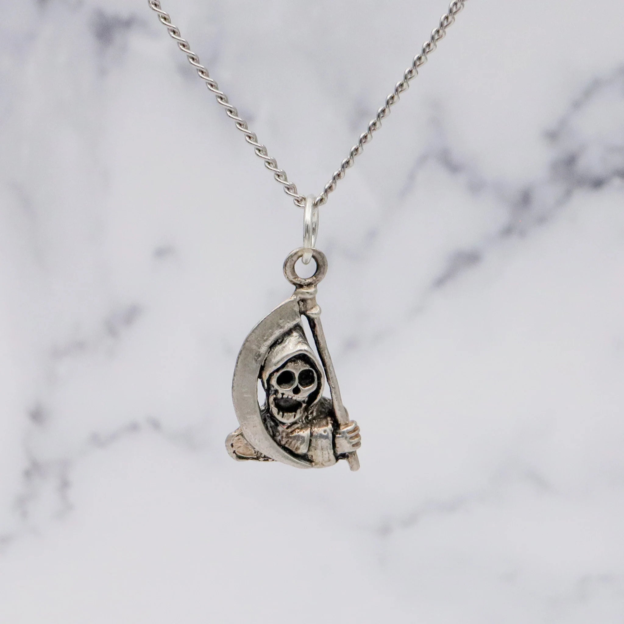 Vintage handmade sterling death pendant