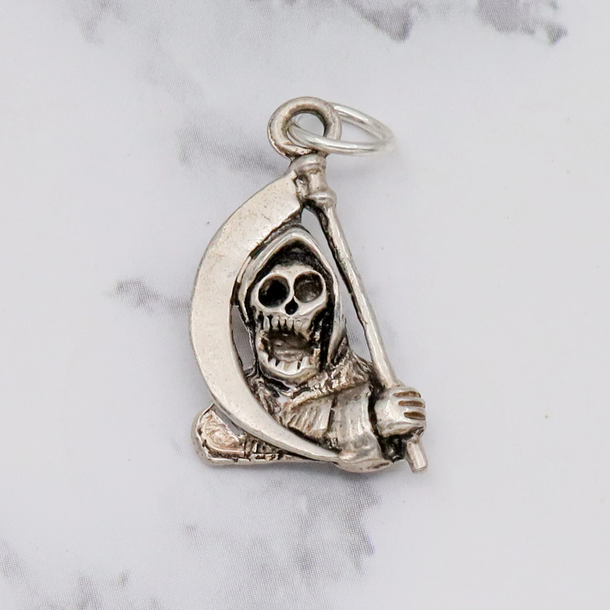 Vintage handmade sterling death pendant