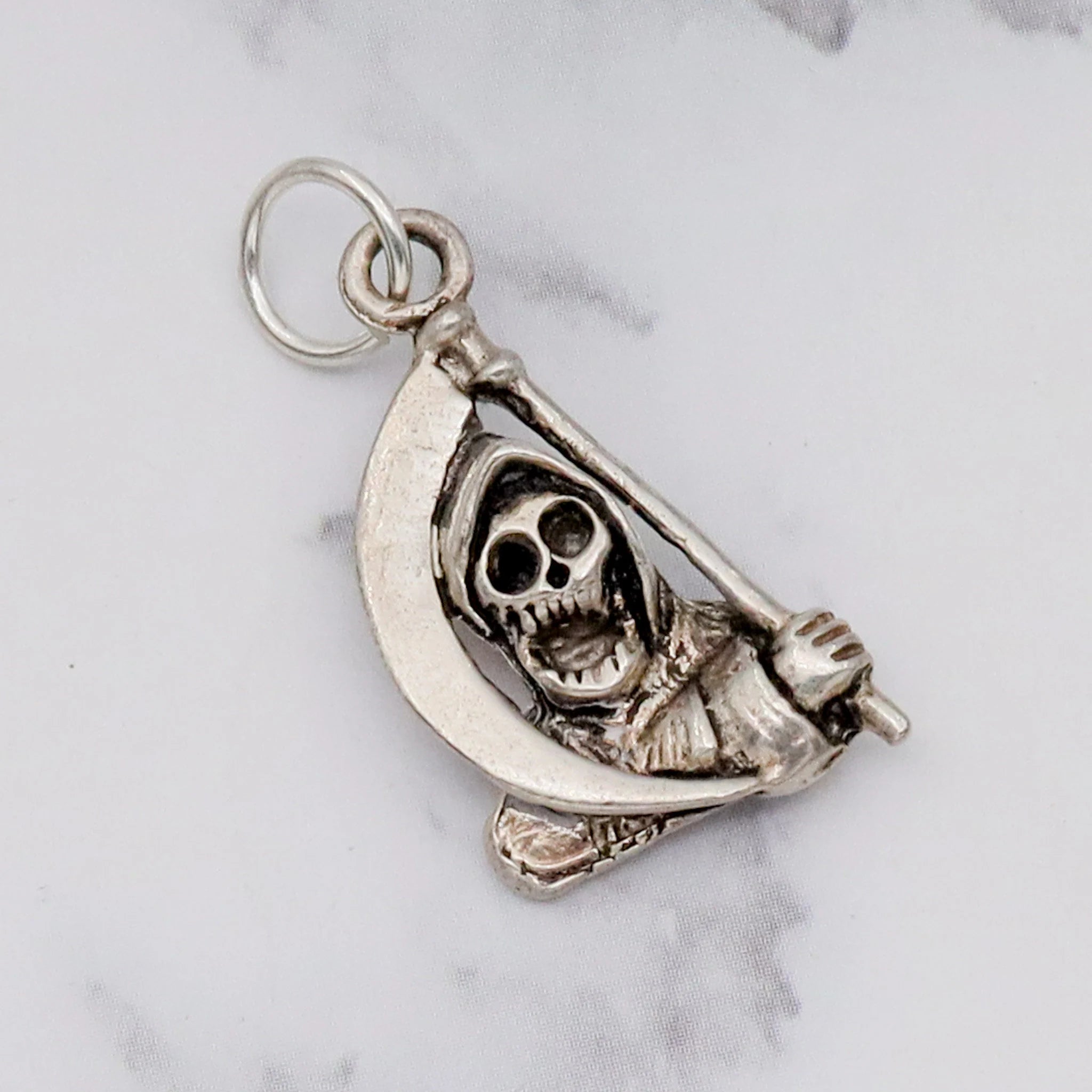 Vintage handmade sterling death pendant