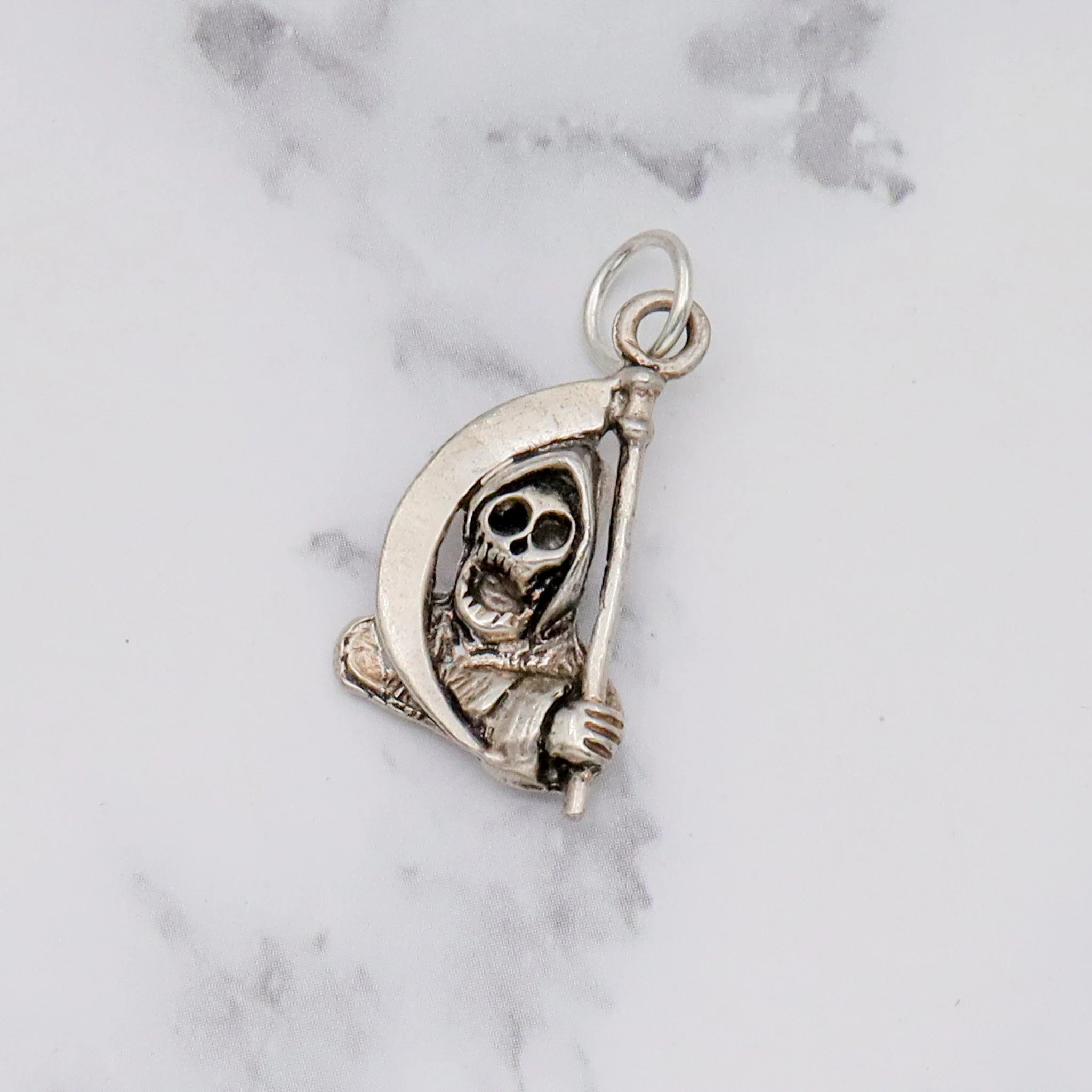 Vintage handmade sterling death pendant