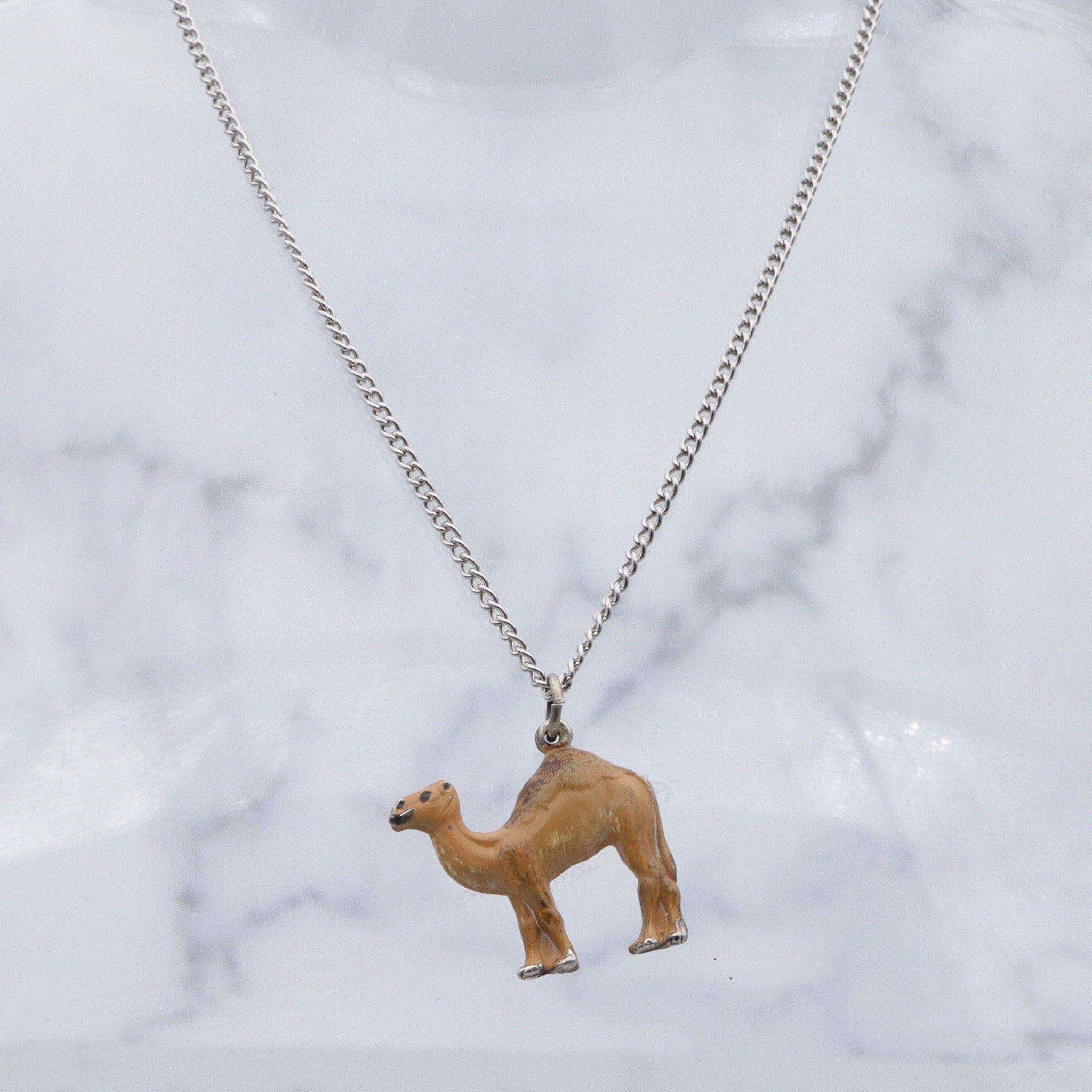 Antique enameled sterling figural camel pendant