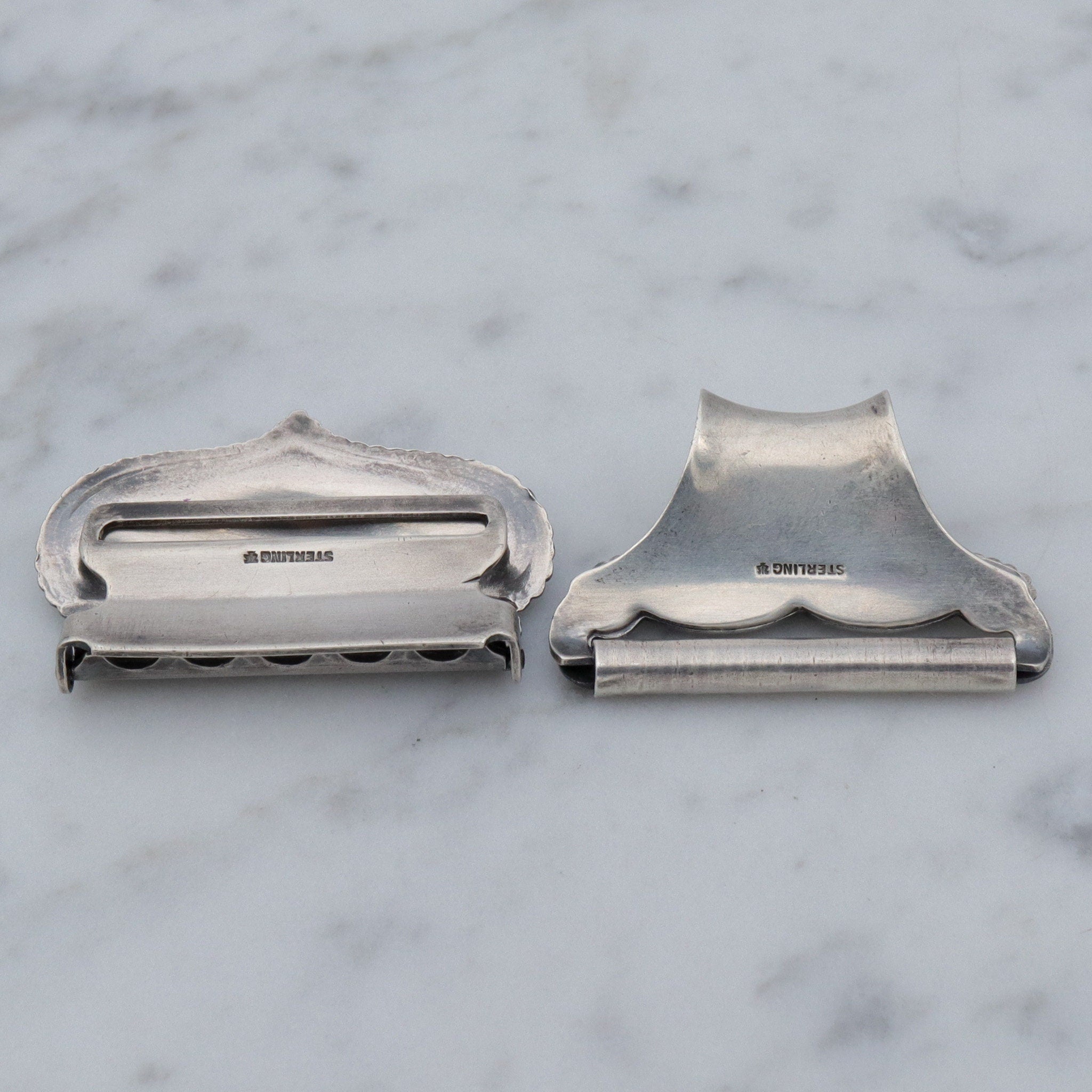 Pair of Antique sterling suspender buckle clips by Sloan & Co.