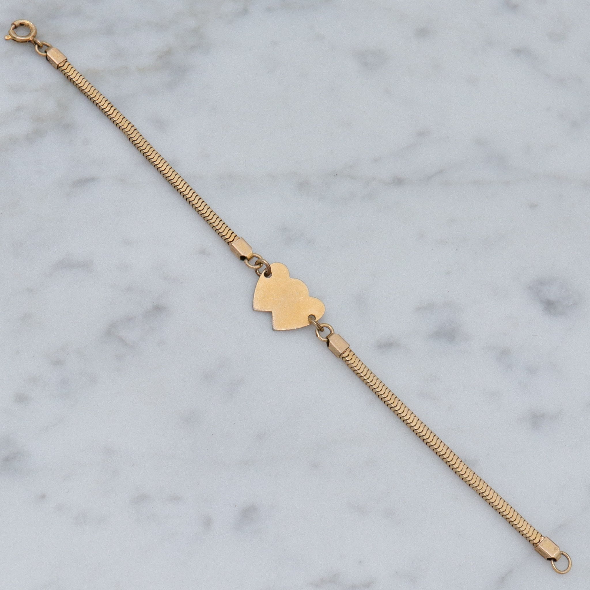 Mid Century gold filled child’s bracelet with double heart name plaque