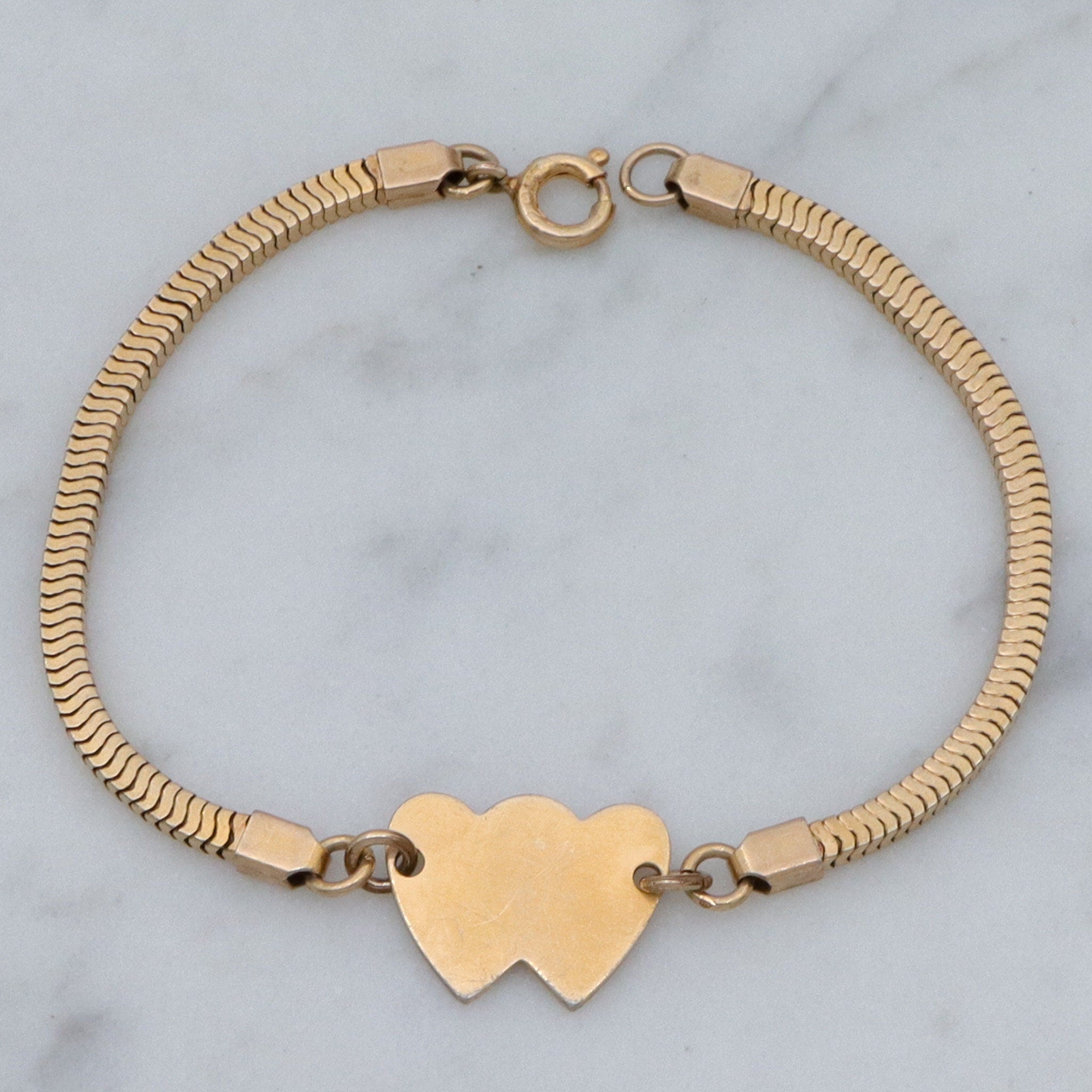 Mid Century gold filled child’s bracelet with double heart name plaque