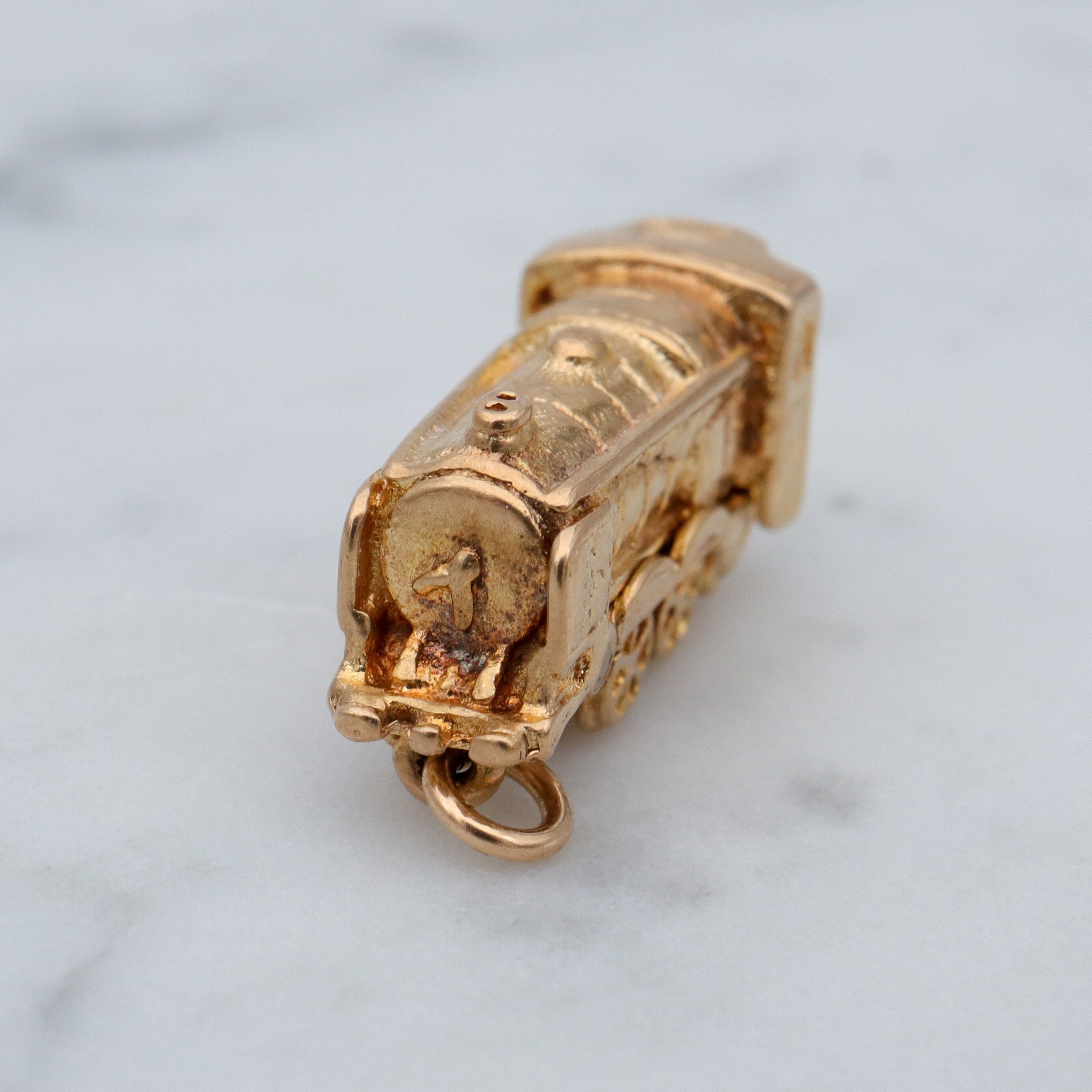 Vintage English 9k gold opening “Bon Voyage” locomotive charm