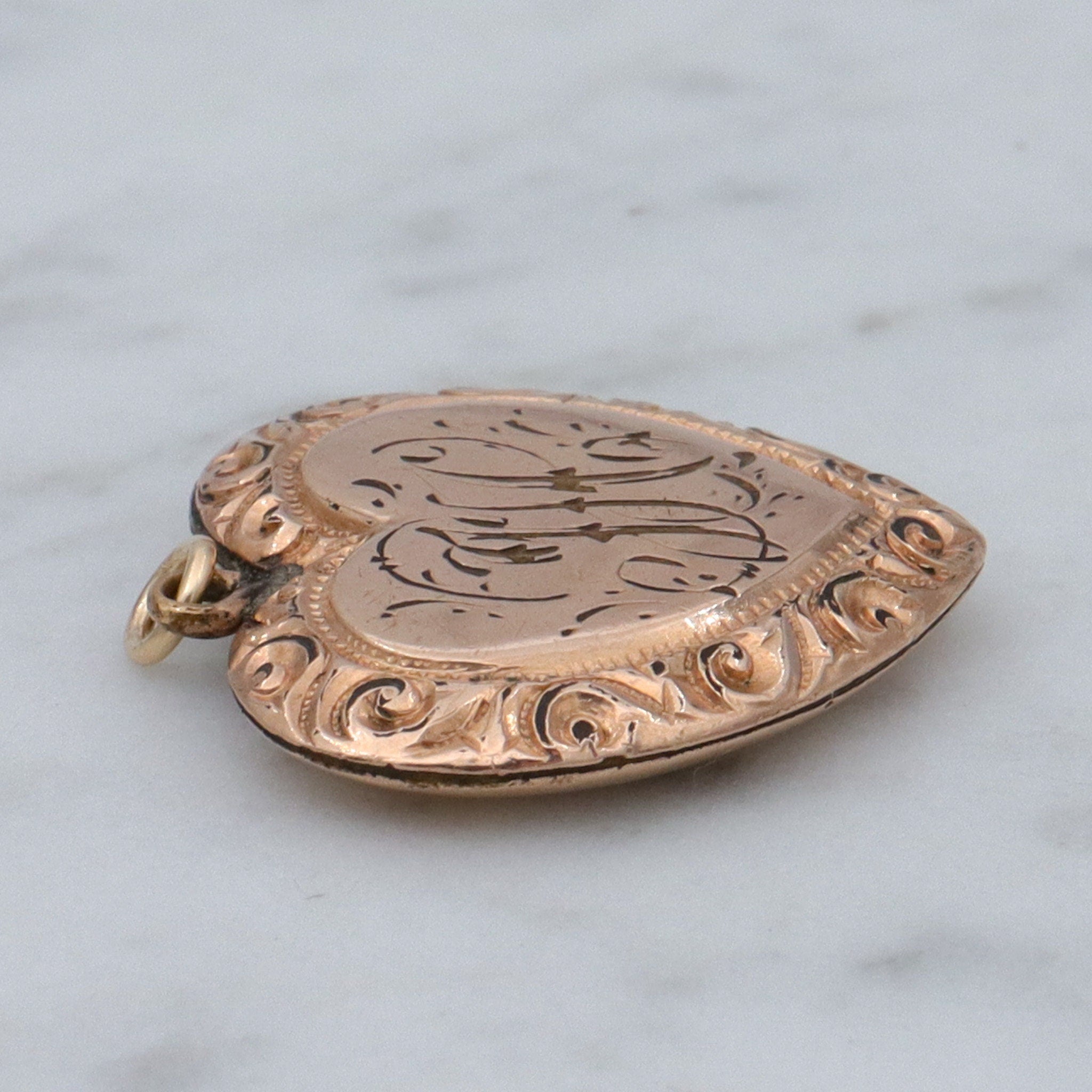 Antique Victorian gold filled repousse heart pendant with “HC” monogram
