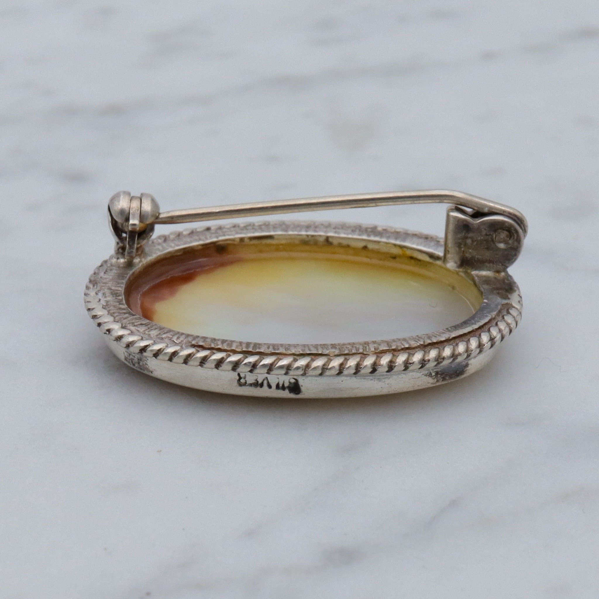 Vintage transfer printed miniature painting on mother of pearl sterling brooch