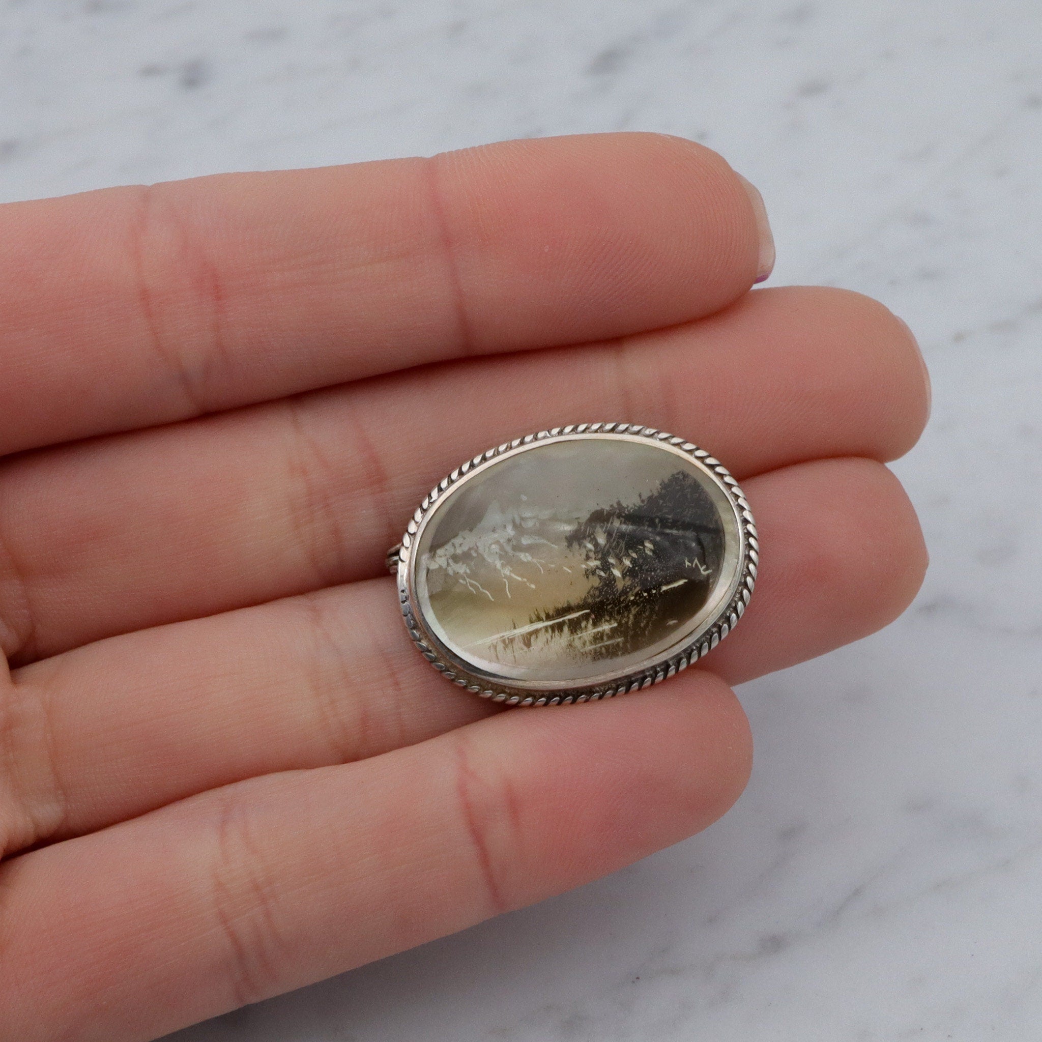 Vintage transfer printed miniature painting on mother of pearl sterling brooch