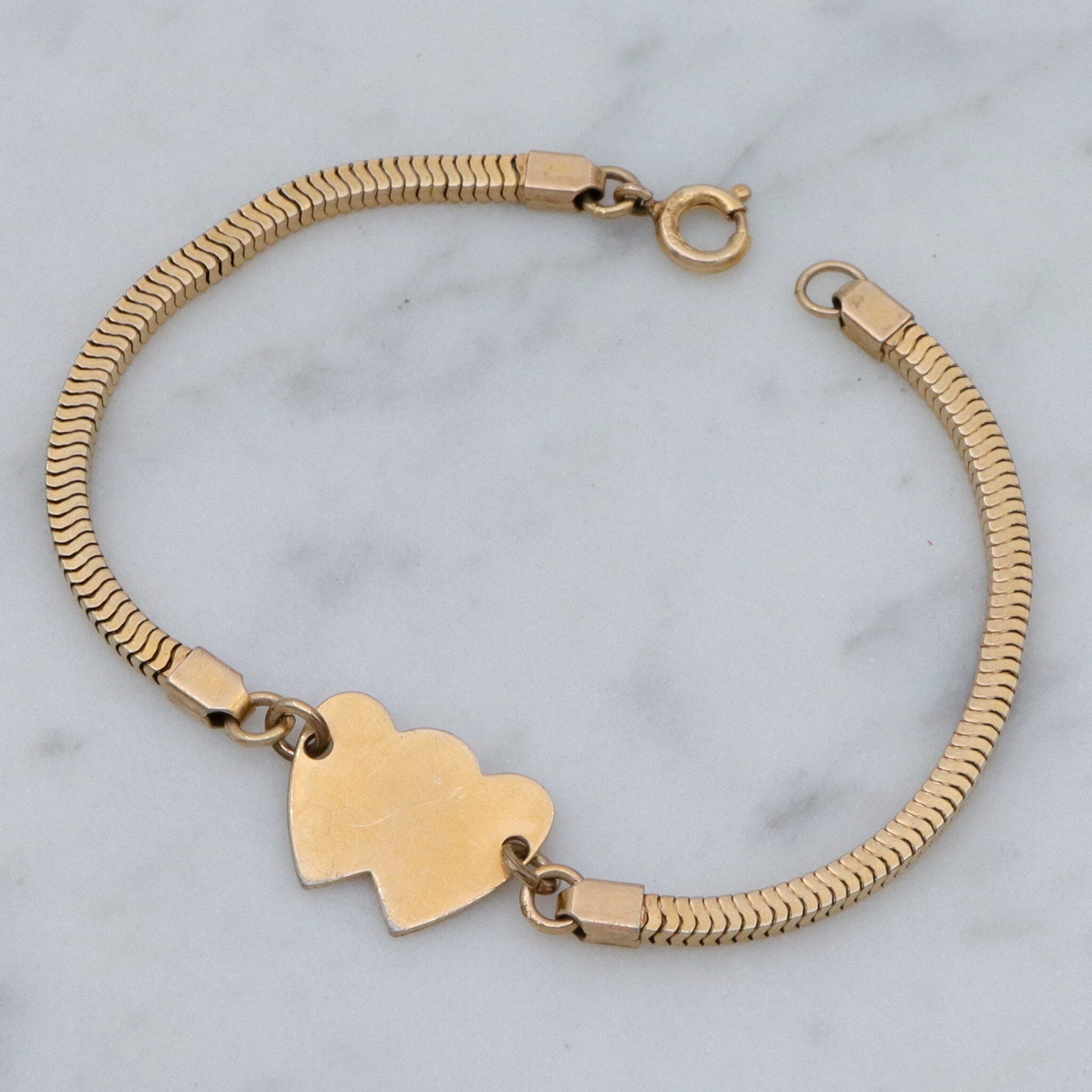 Mid Century gold filled child’s bracelet with double heart name plaque