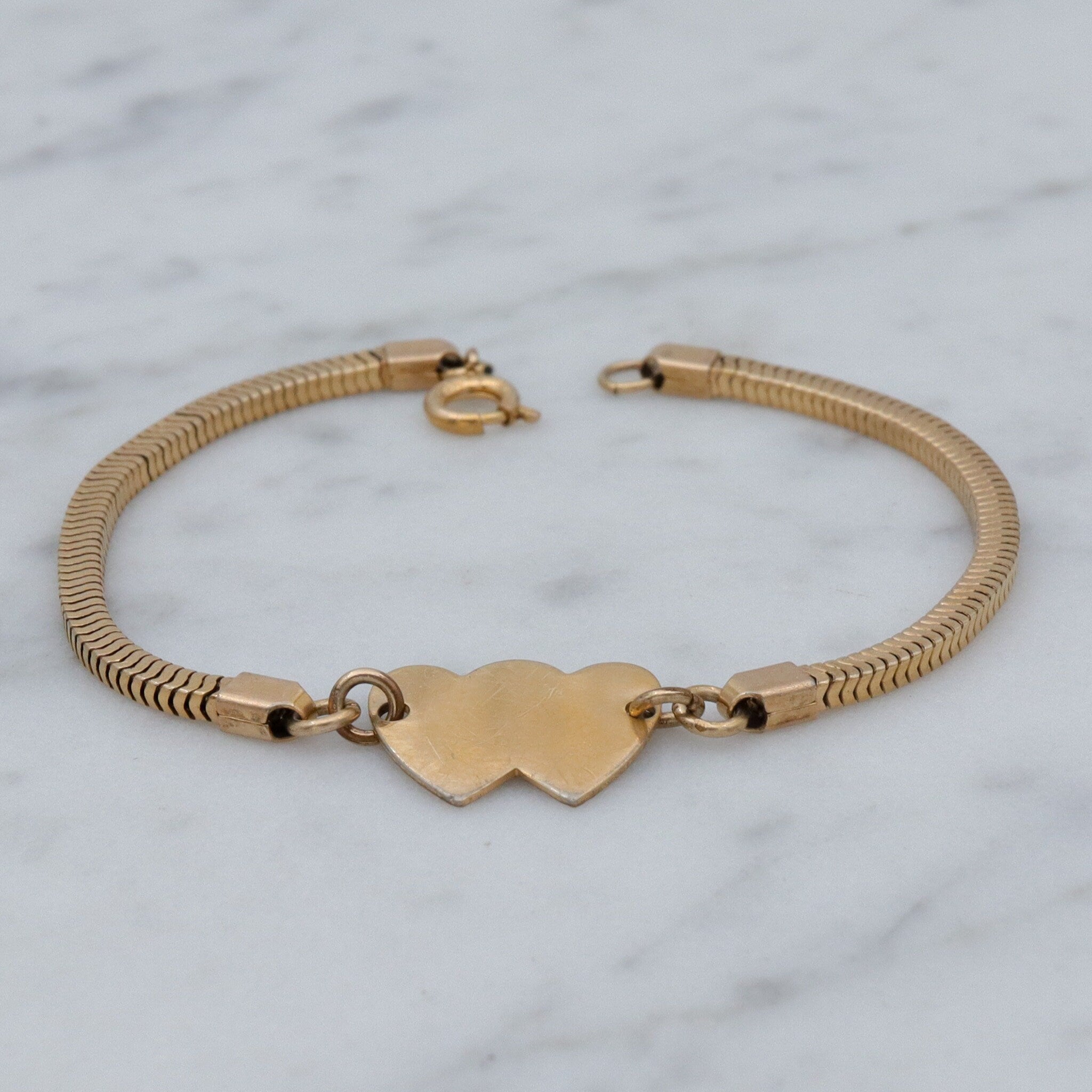 Mid Century gold filled child’s bracelet with double heart name plaque