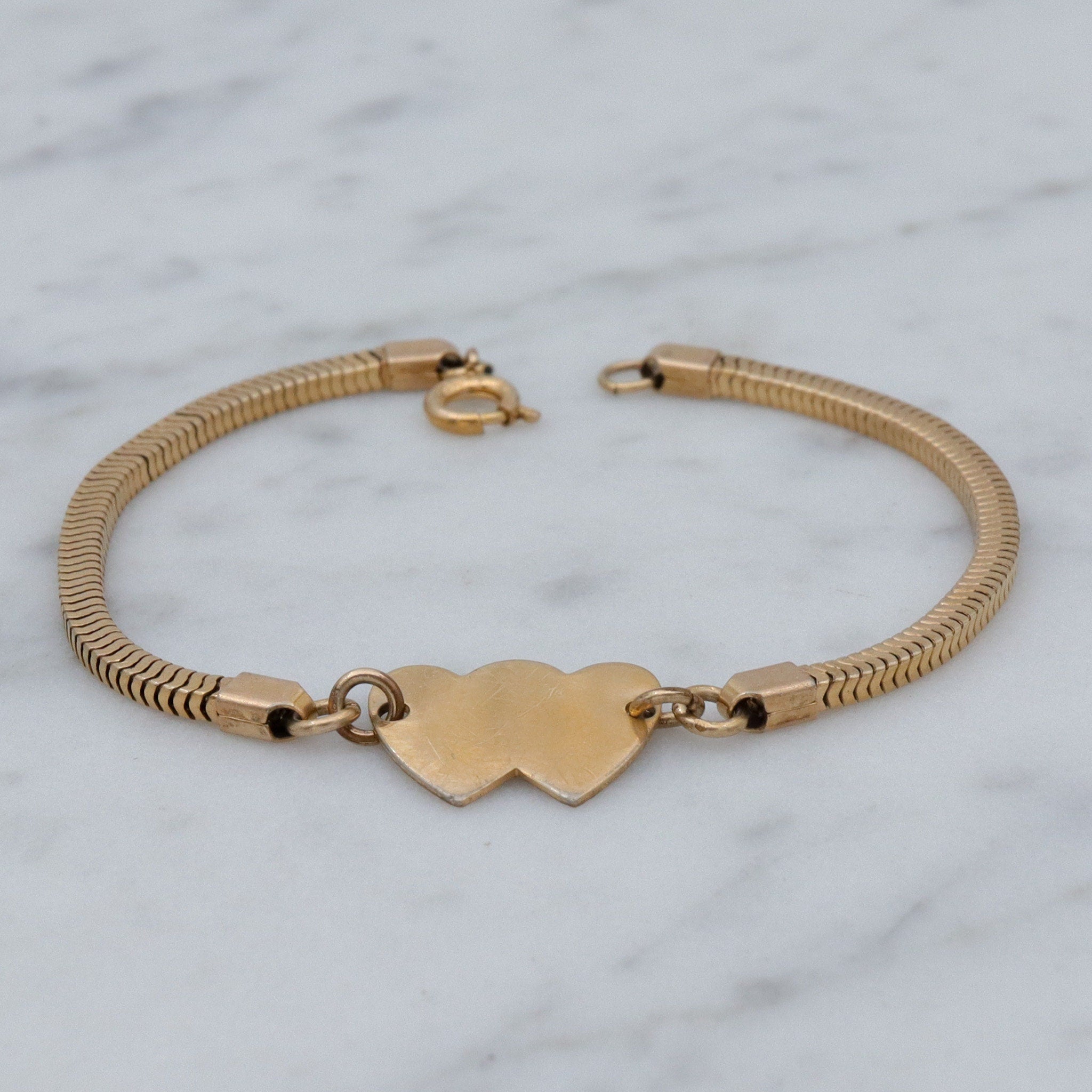 Mid Century gold filled child’s bracelet with double heart name plaque