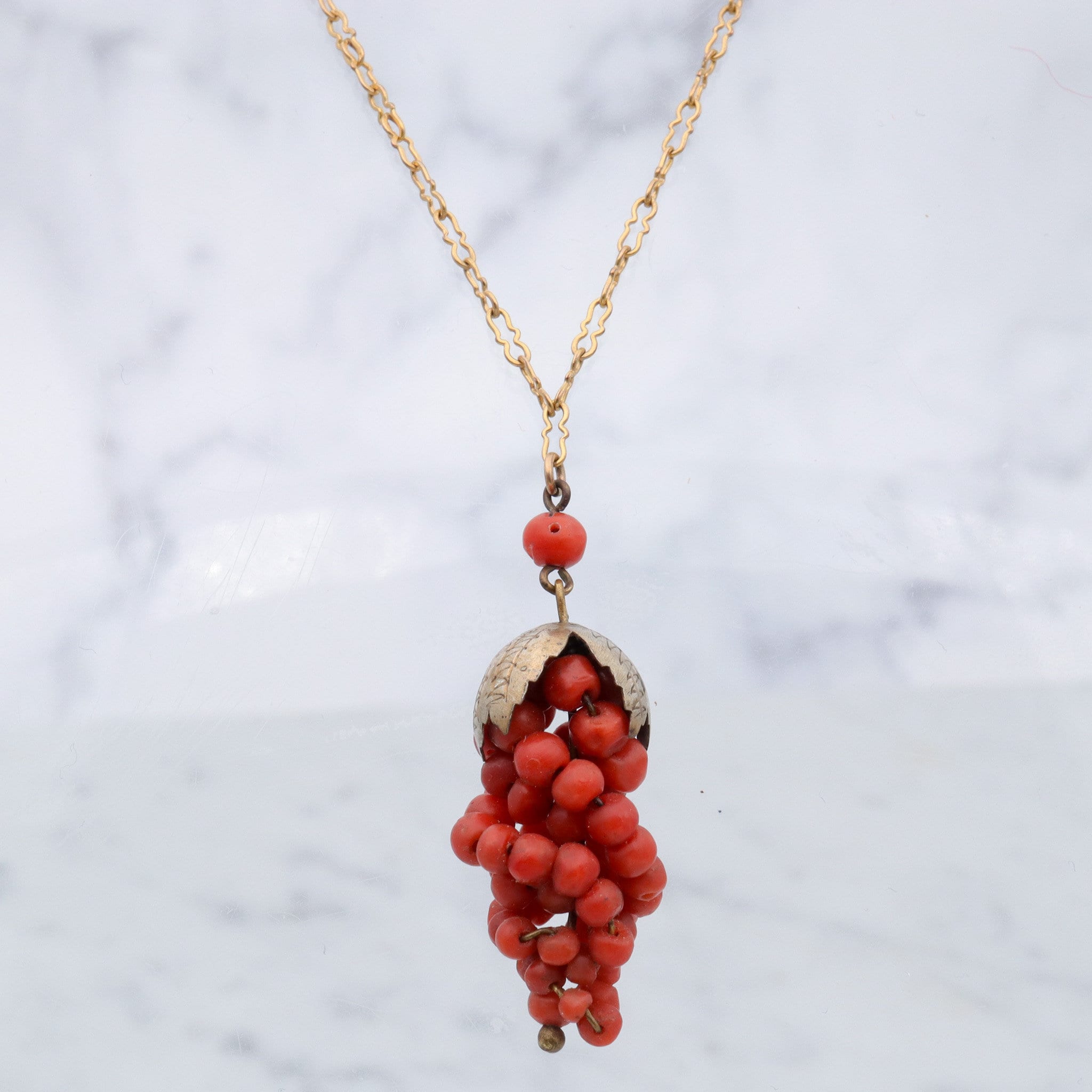Antique Victorian gilt metal coral bead grape bunch pendant on gold filled crinkle chain
