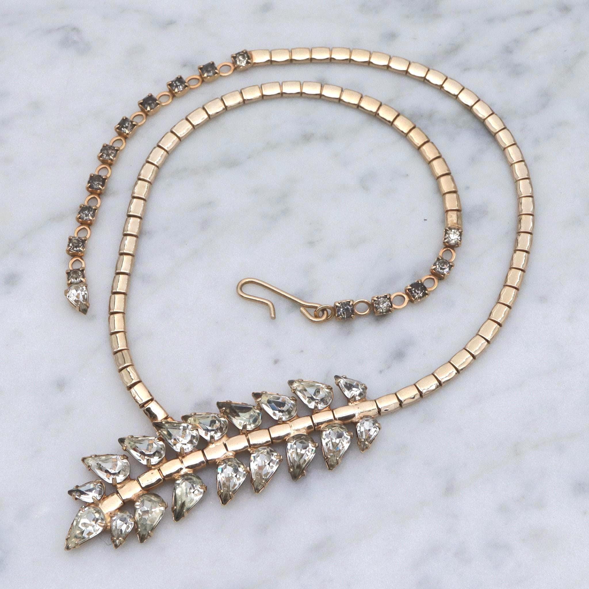 Retro gold plated rhinestone leaves lariat style necklace