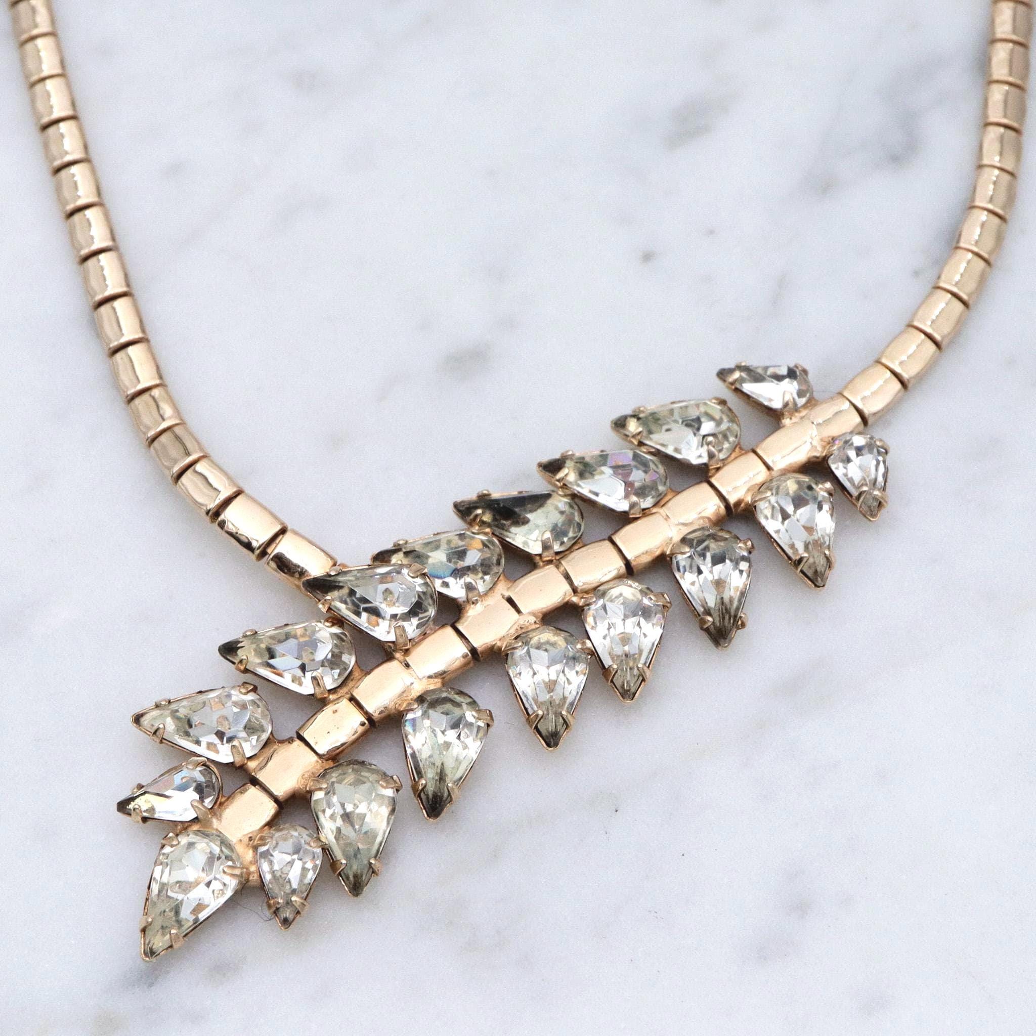 Retro gold plated rhinestone leaves lariat style necklace