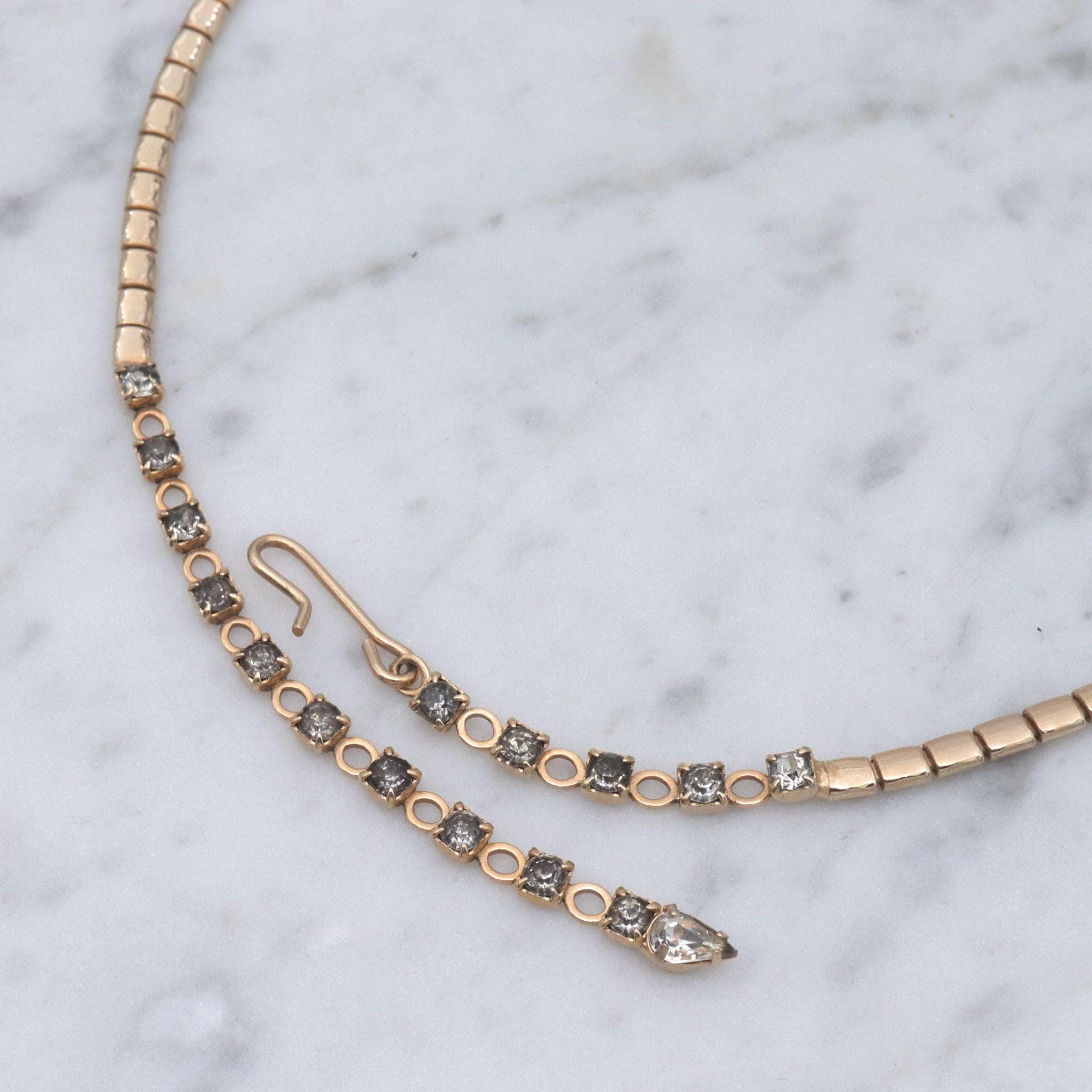 Retro gold plated rhinestone leaves lariat style necklace