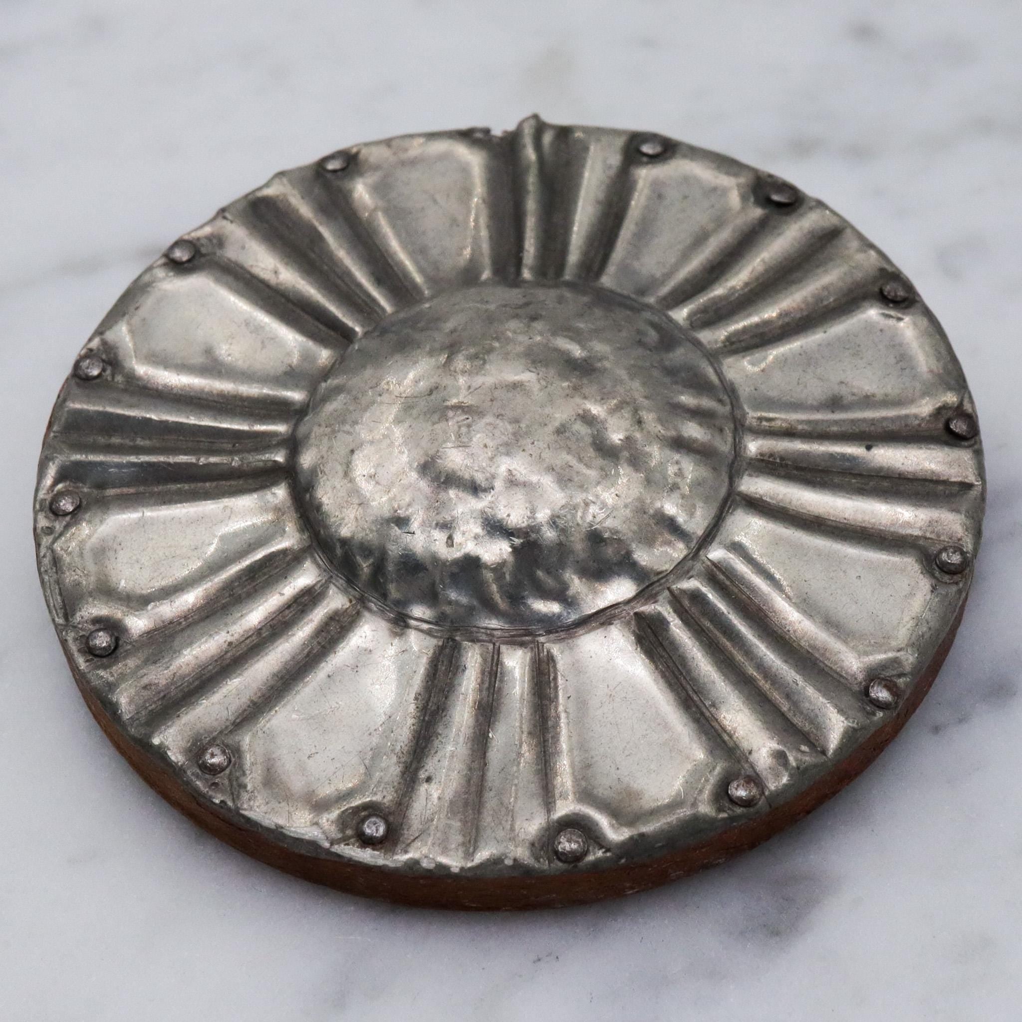 Antique Arts & Crafts period handmade pewter and wood flower brooch
