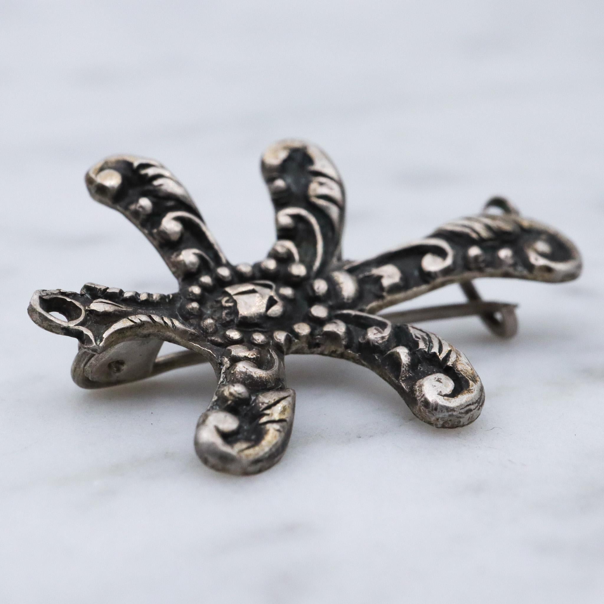Antique renaissance revival sterling silver brooch