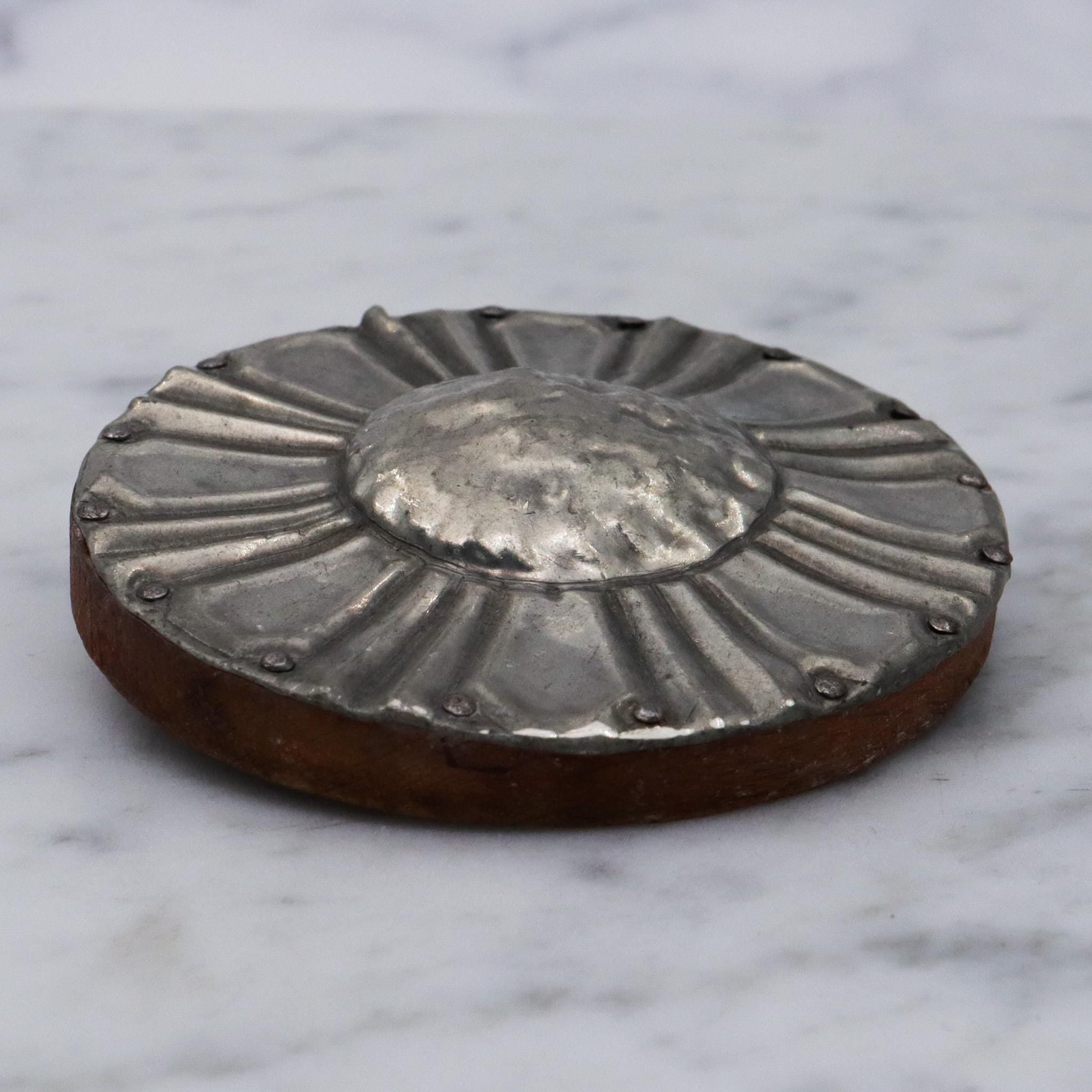 Antique Arts & Crafts period handmade pewter and wood flower brooch