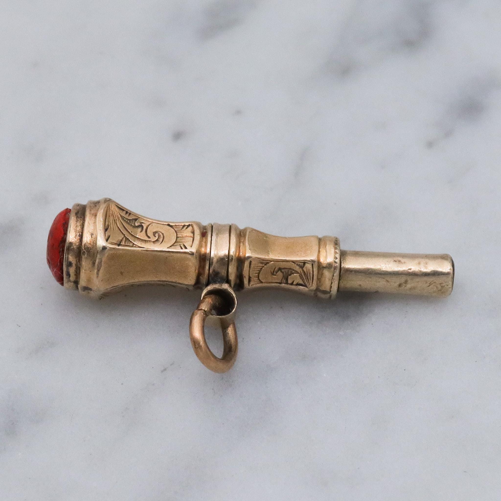 Antique Victorian 10k gold watch key fob with red stone end