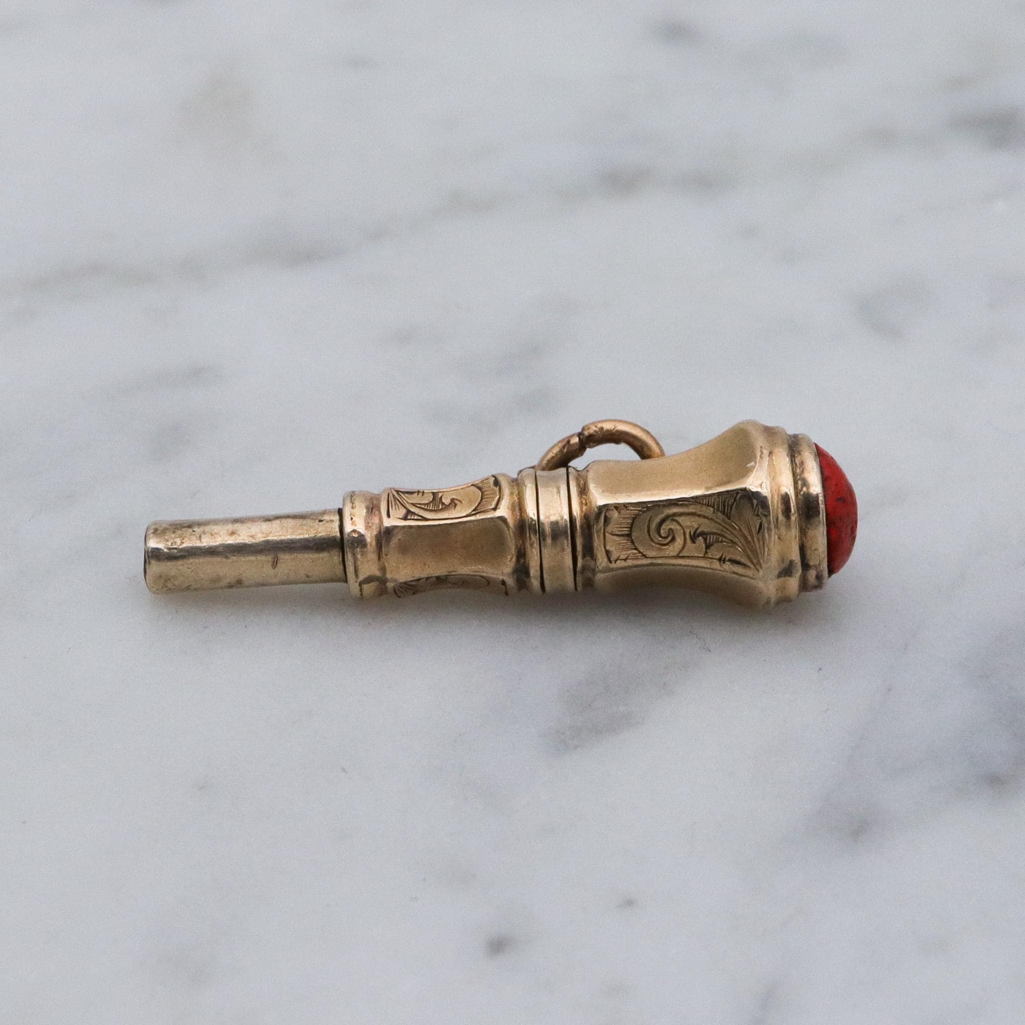Antique Victorian 10k gold watch key fob with red stone end